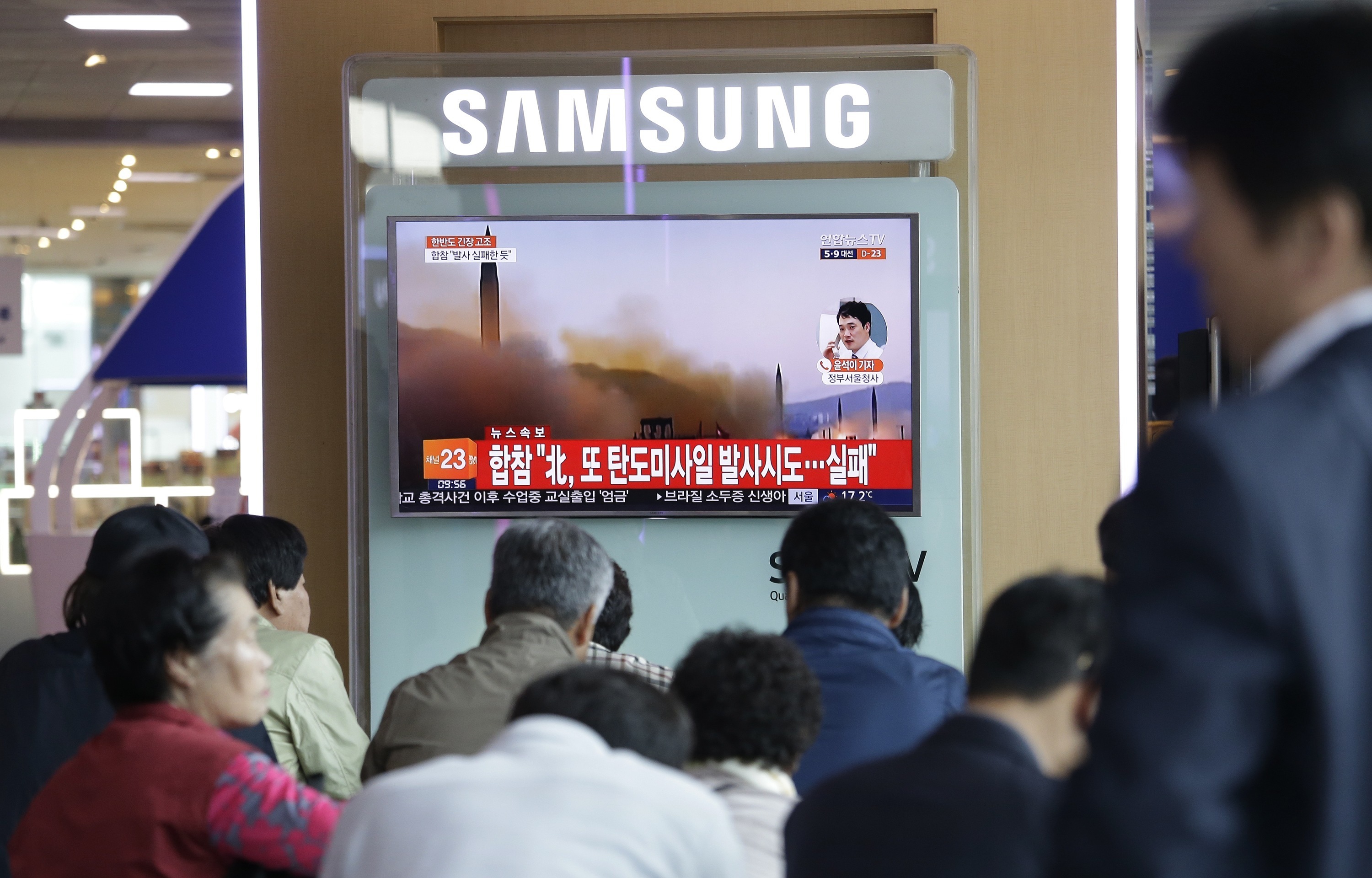 A TV screen shows file footage of North Korea's ballistic missiles, at Seoul Railway Station in Seoul, South Korea, Sunday, April 16, 2017. A North Korean missile exploded during launch Sunday from the country's east coast, U.S. and South Korean officials said, a high-profile failure that comes as a powerful U.S. aircraft carrier approaches the Korean Peninsula in a show of force. The letters on the top read 