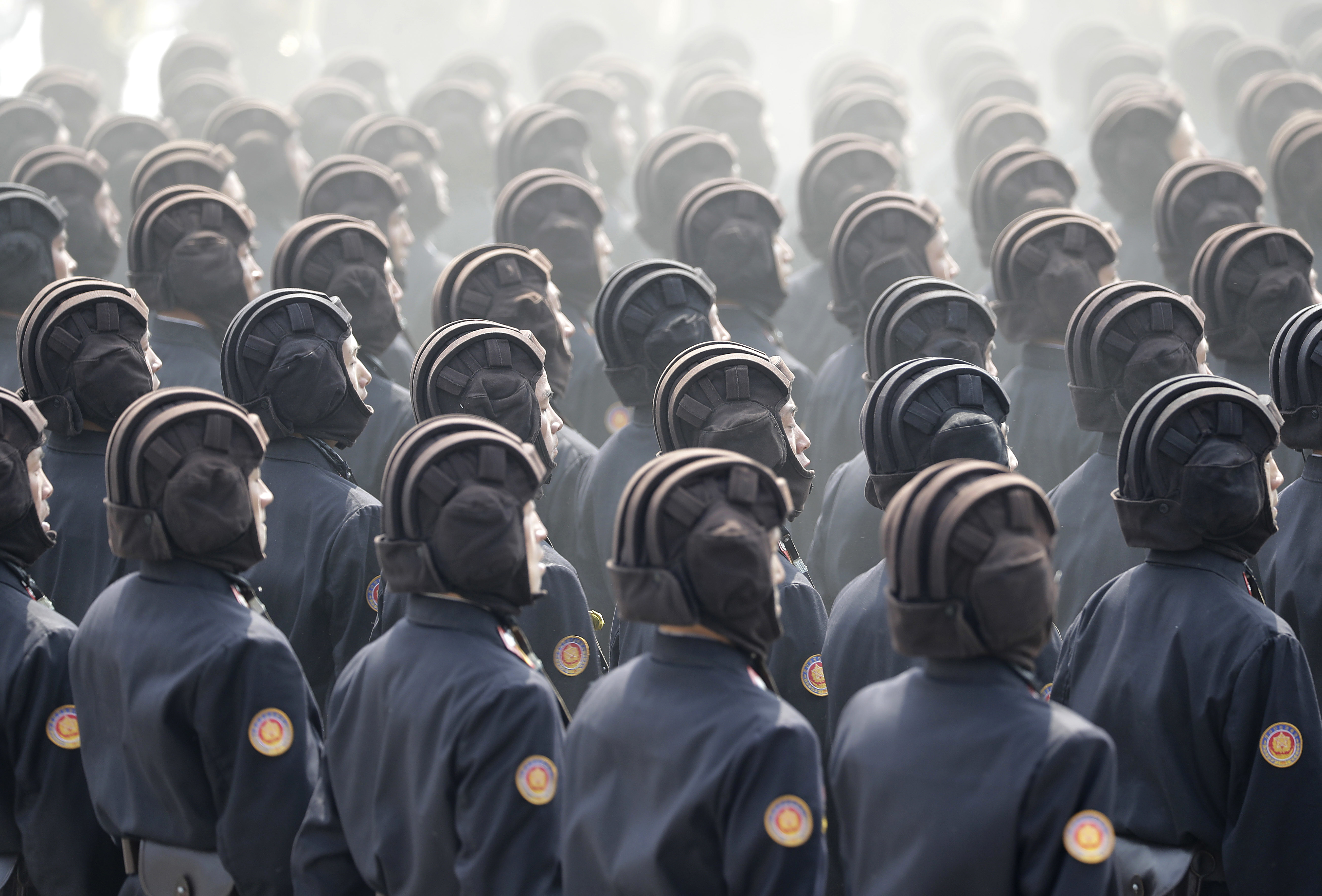 In this Saturday, April 15, 2017 photo, soldiers march across Kim Il Sung Square during a military parade in Pyongyang, North Korea, to celebrate the 105th birth anniversary of Kim Il Sung, the country's late founder and grandfather of current ruler Kim Jong Un. (AP Photo/Wong Maye-E, File)