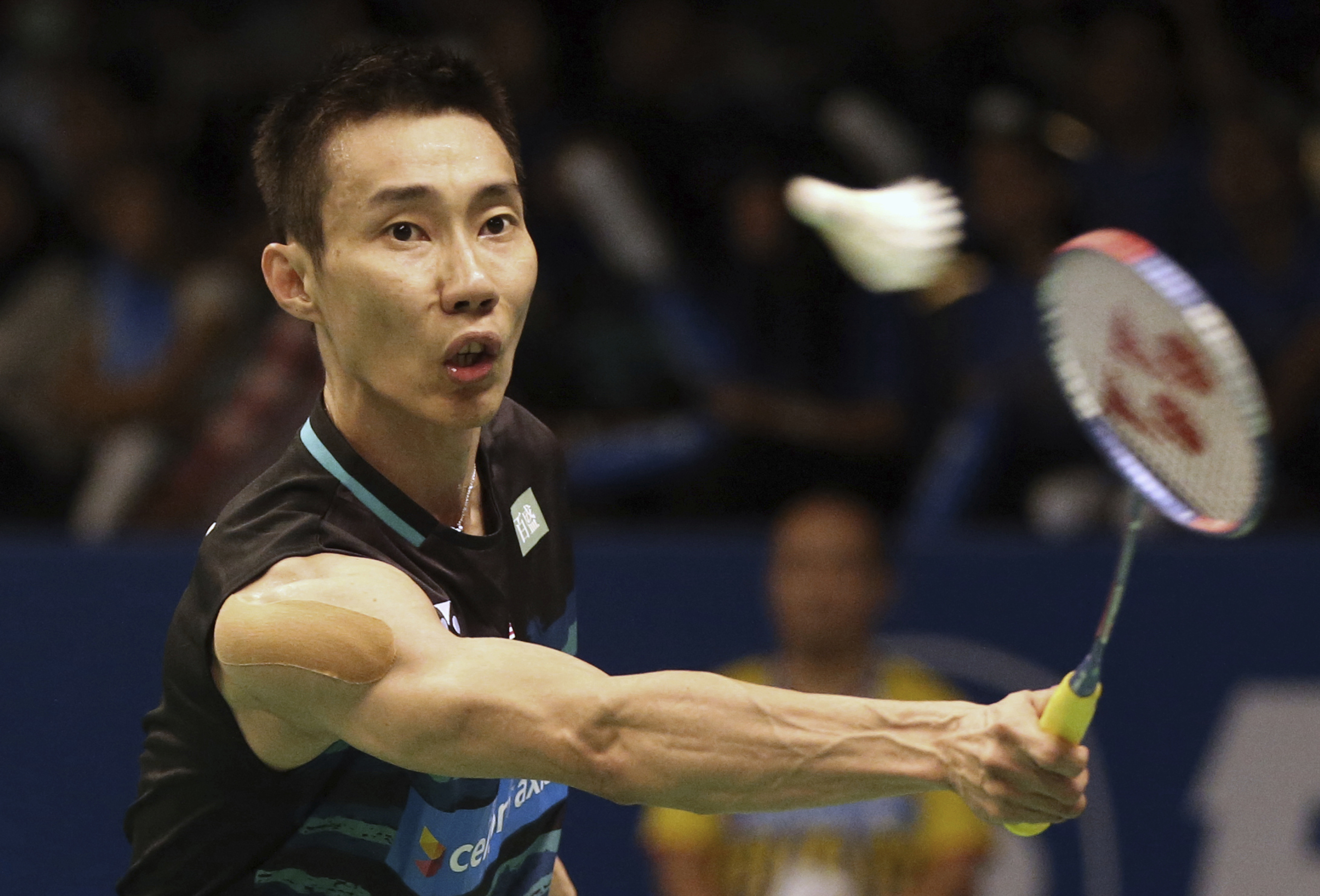 Malaysia's Lee Chong Wei returns the shuttlecock against India's HS Prannoy during the second round of Indonesia Open badminton championship in Jakarta, Indonesia, Thursday, June 15, 2017. (AP Photo/Dita Alangkara)