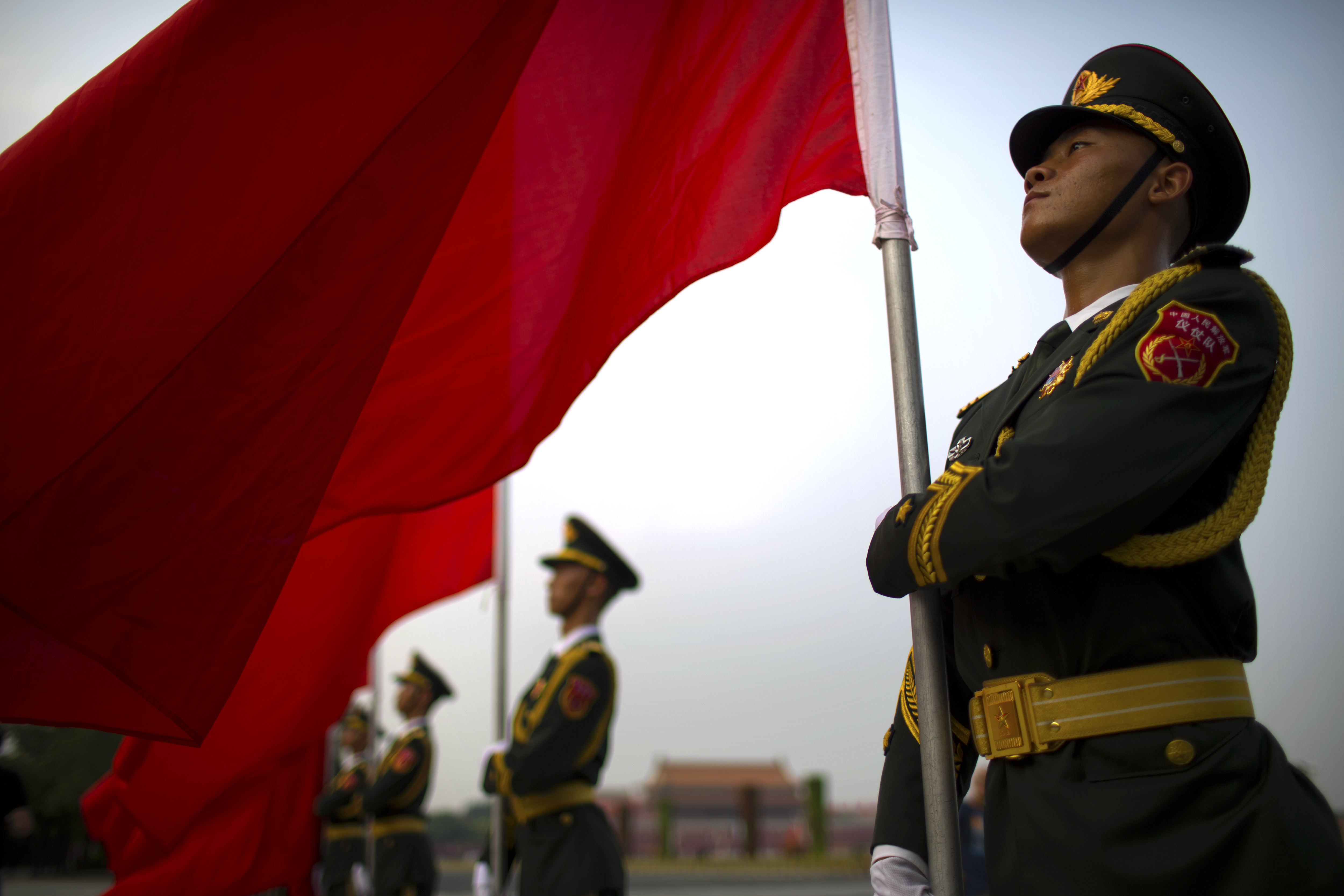Members of a Chinese honor guard stand in formation before a welcome ceremony for Palestinian President Mahmoud Abbas at the Great Hall of the People in Beijing, Tuesday, July 18, 2017. (AP Photo/Mark Schiefelbein)