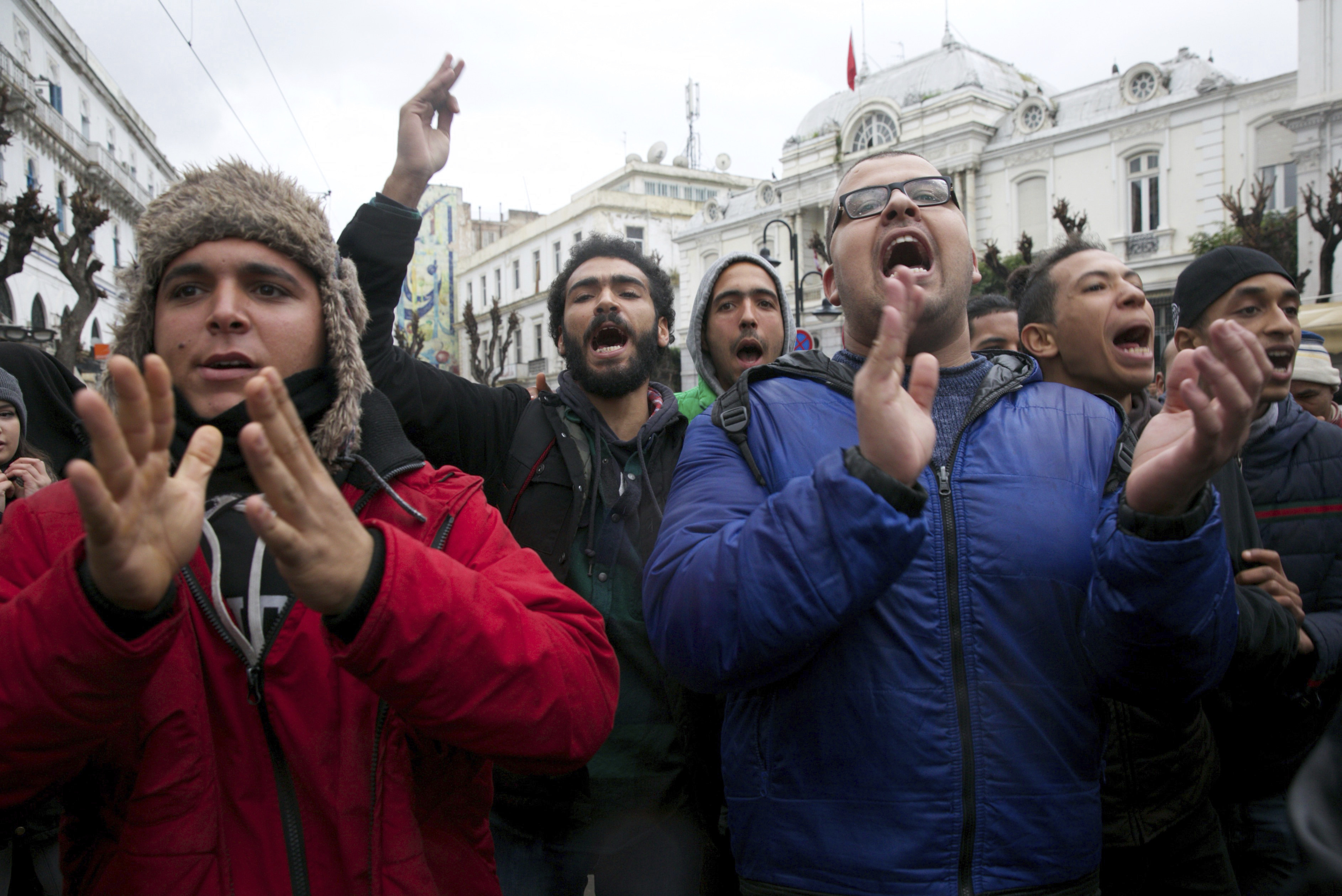 Protestors chant slogans during a demonstration in Tunis, Tunisia, Friday Jan. 12, 2018. Tunisia's government says protests appear to be subsiding after anger over food prices led to days of clashes with police that left one dead, dozens injured and widespread damage. (AP Photo/Hassene Dridi)