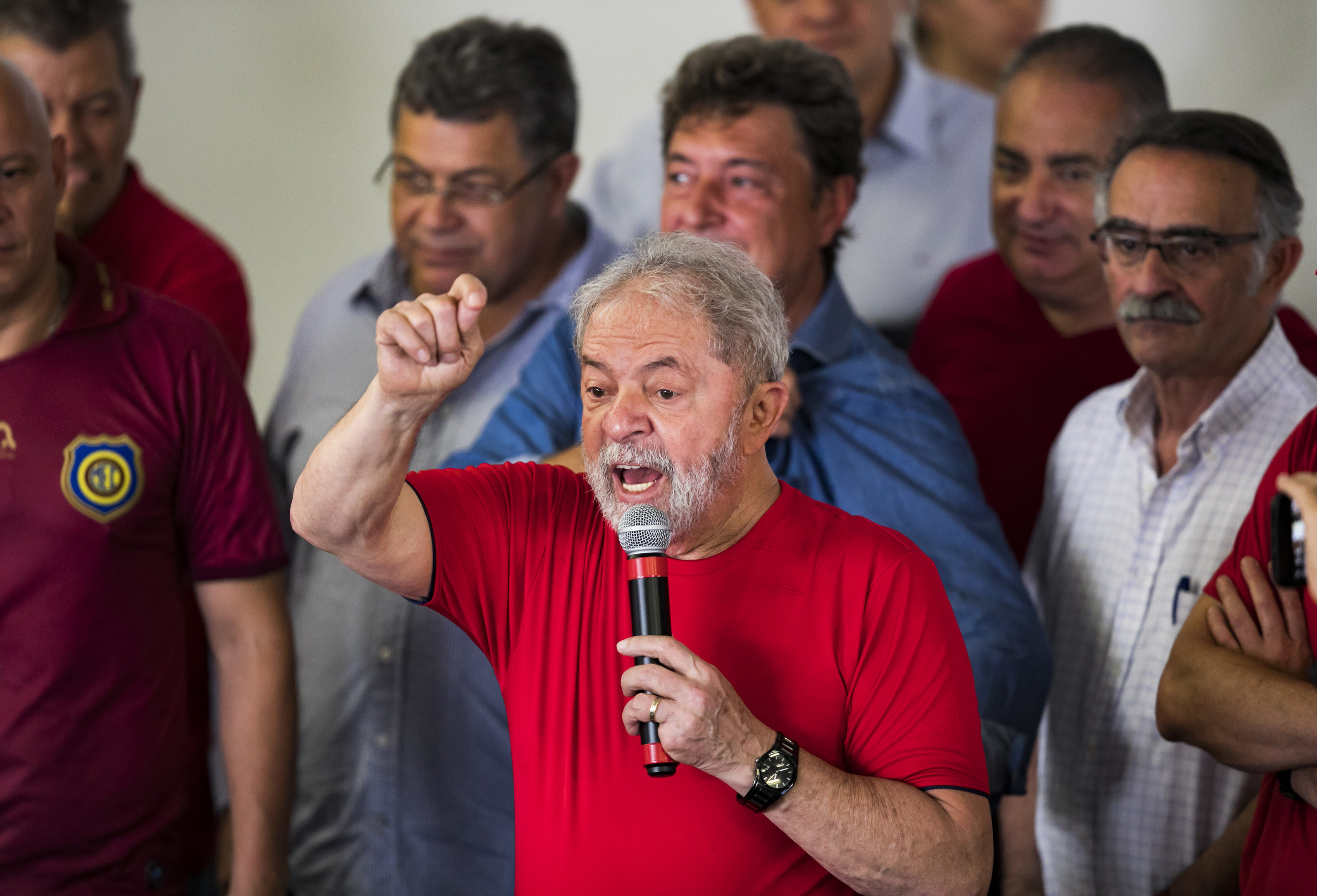 Former President Luiz Inacio Lula da Silva speaks supporters during a visit to the metallurgic syndicate headquarters in Sao Bernardo do Campo, Brazil, Wednesday, Jan. 24, 2018. An appellate court in Brazil is considering whether to uphold or throw out a corruption conviction against da Silva, a decision that could impact whether the former leader can run for president. The 72-year-old leads preference polls for October’s race. (AP Photo/Marcelo Chello)