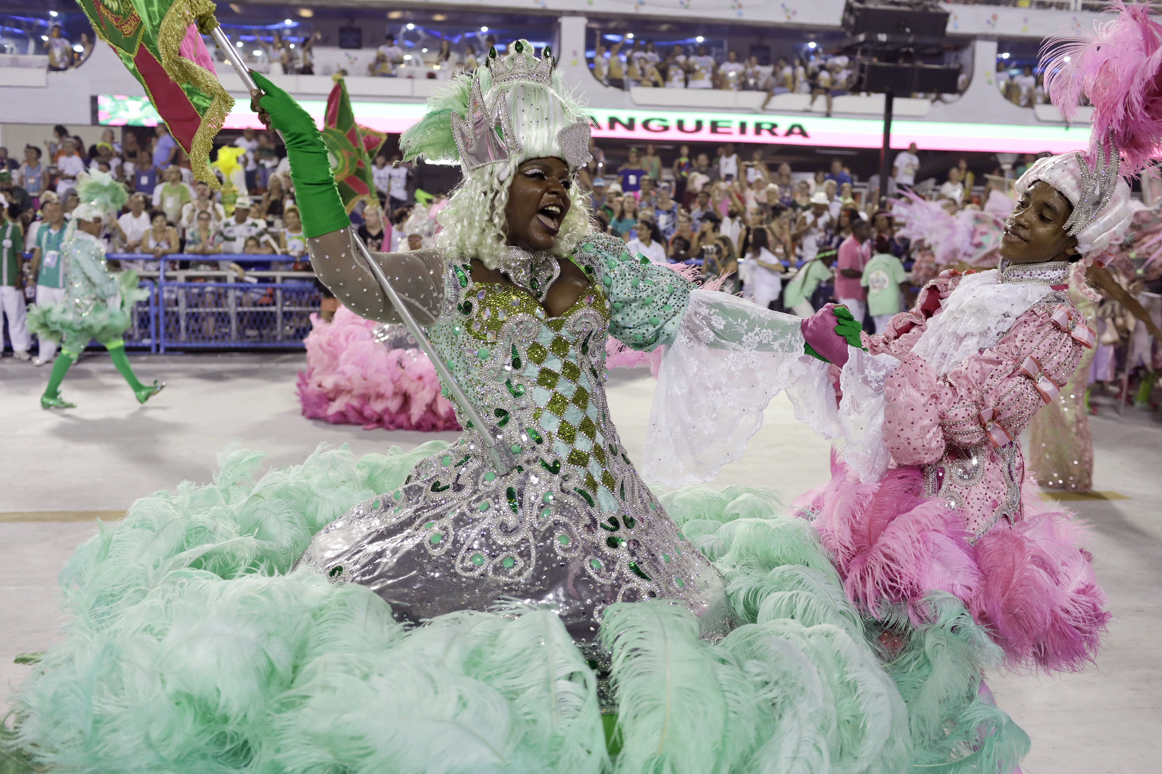 Performers from Mangueira samba school parade during Carnival celebrations at the Sambadrome in Rio de Janeiro, Brazil, Monday, Feb. 12, 2018. (AP Photo/Leo Correa)