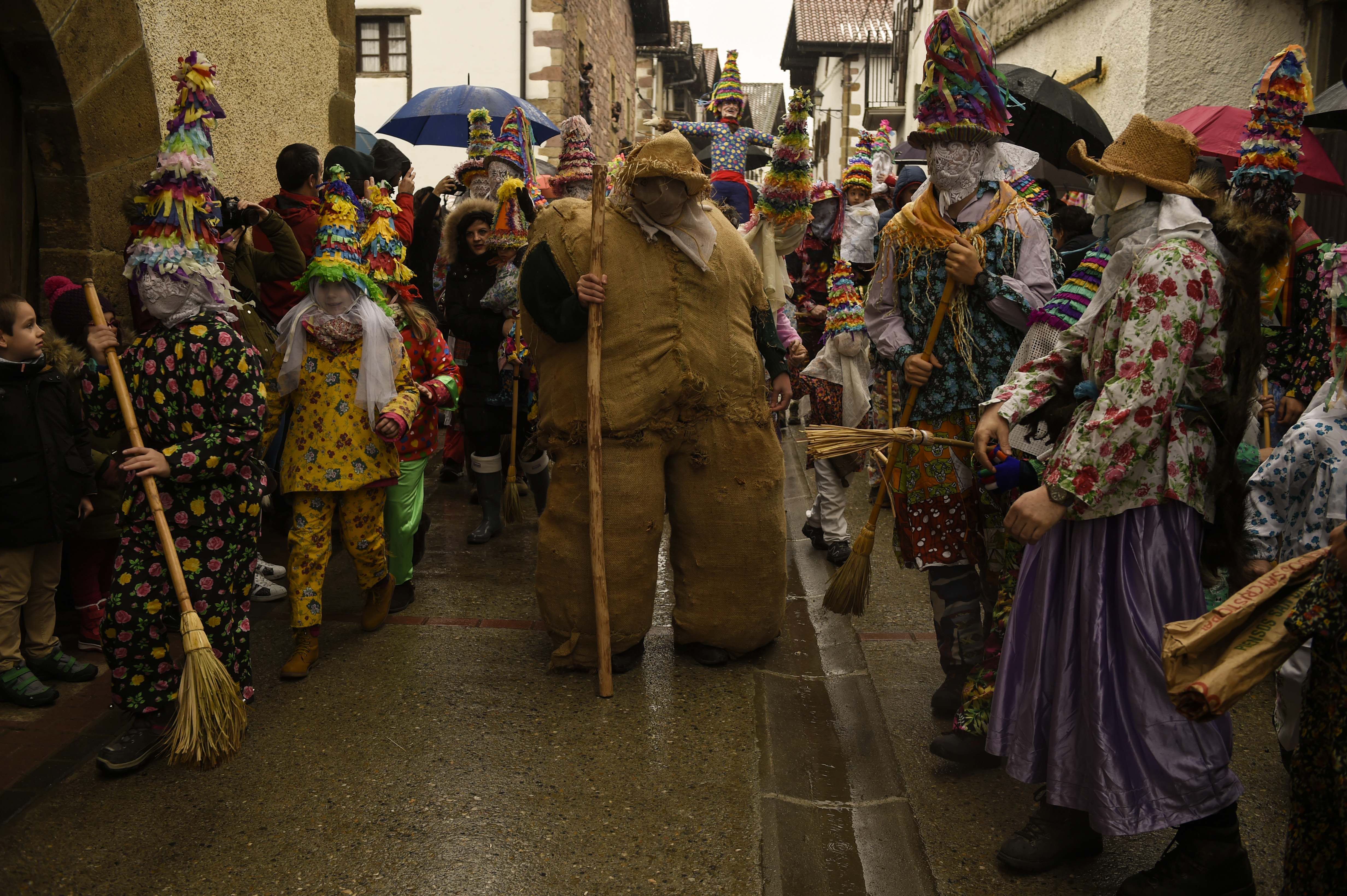 Rural carnival of Lanz is held on February 11, 2018 in Lantz, Spain. The carnival is a great tradition, where the forces of evil and good face-off in a symbolic battle in which the thirst of justice mobilizes the popular ires. Several prominent figures accompany him in the parade: Ziripot, easy-going man and chubby person done based on stuffed sacks of ferns and hay, who scarcely can be kept in foot; the Zaldiko, horse chases fierceness that rushes forth at him up to it throwing at the soil; the Arotzak carry hammers and pliers, and run after the Zaldiko to shoe it, and finally the Txatxos, which sheathed in skins of animals and armed with sticks and brooms, shout while scourge to all the presents. (Photo by Oscar Zubiri / Pacific Press/Sipa USA)(Sipa via AP Images)
