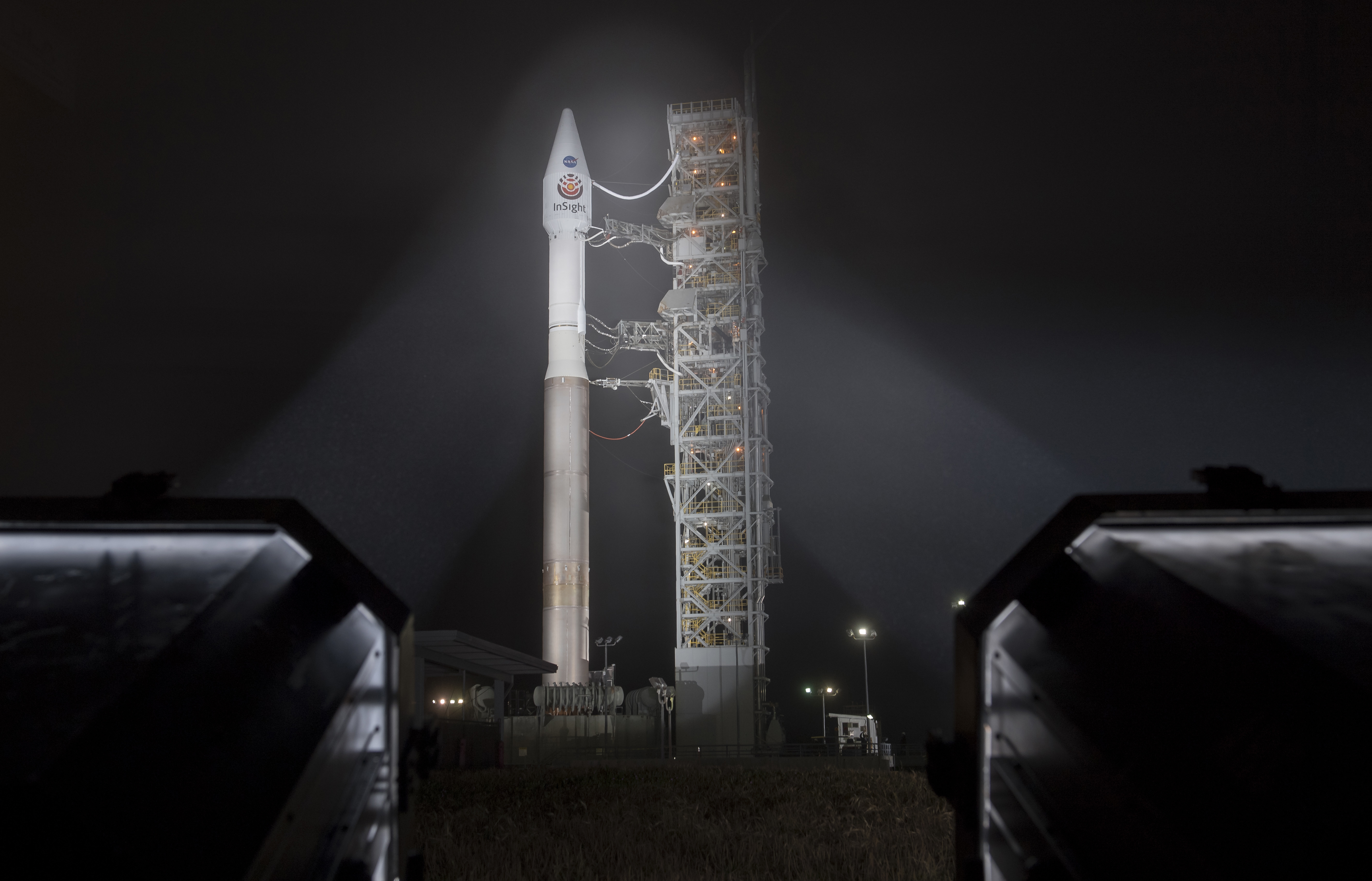 This photo released by NASA shows a United Launch Alliance (ULA) Atlas-V rocket with NASA's InSight spacecraft onboard shortly after the mobile service tower was rolled back, Friday, May 4, 2018, at Vandenberg Air Force Base in Calif. The rocket is set to launch early Saturday. (Bill Ingalls/NASA via AP)