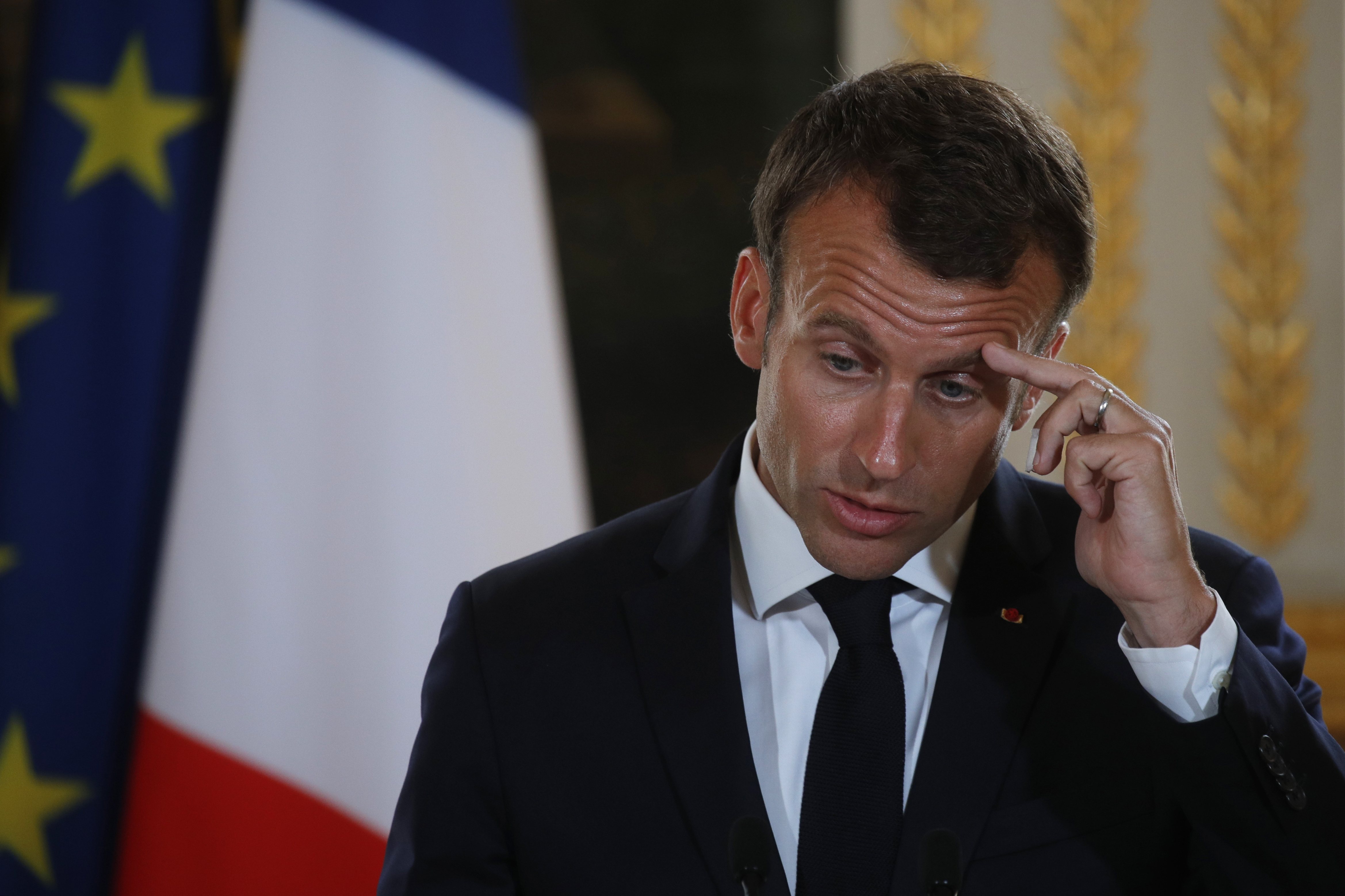 French President Emmanuel Macron attends a joint news conference with Angola's President Joao Lourenco at the Elysee Palace in Paris, France, Monday, May 28, 2018. (Philippe Wojazer, pool image via AP)