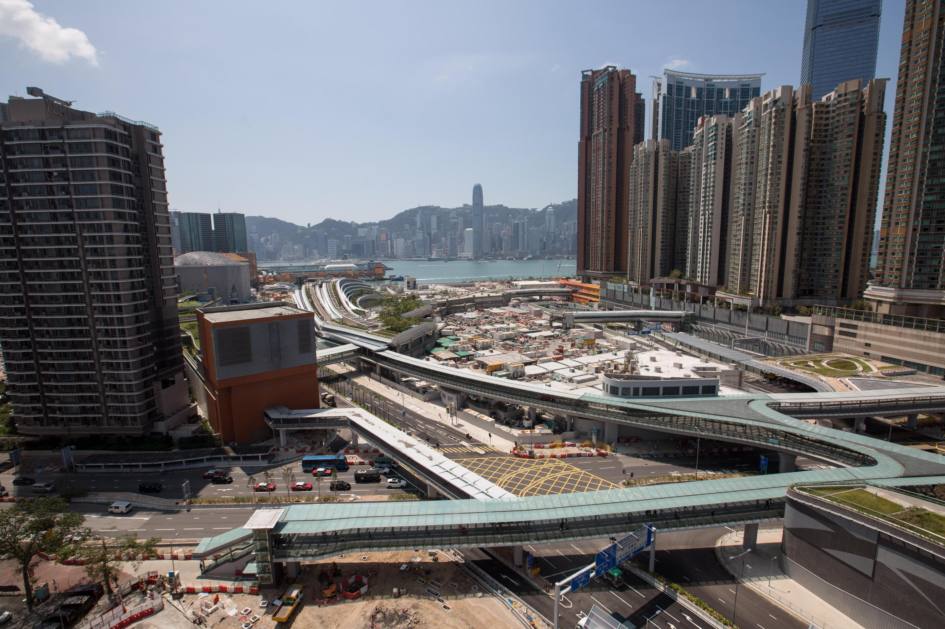 epa07036480 A general view showing the finished complex housing the West Kowloon of the Guangzhou-Shenzhen-Hong Kong Express Rail Link (C) in Hong Kong, China, 21 September 2018. The Hong Kong Section of the Guangzhou-Shenzhen-Hong Kong Express Rail Link will commence operation on 23 September 2018.  EPA/JEROME FAVRE
