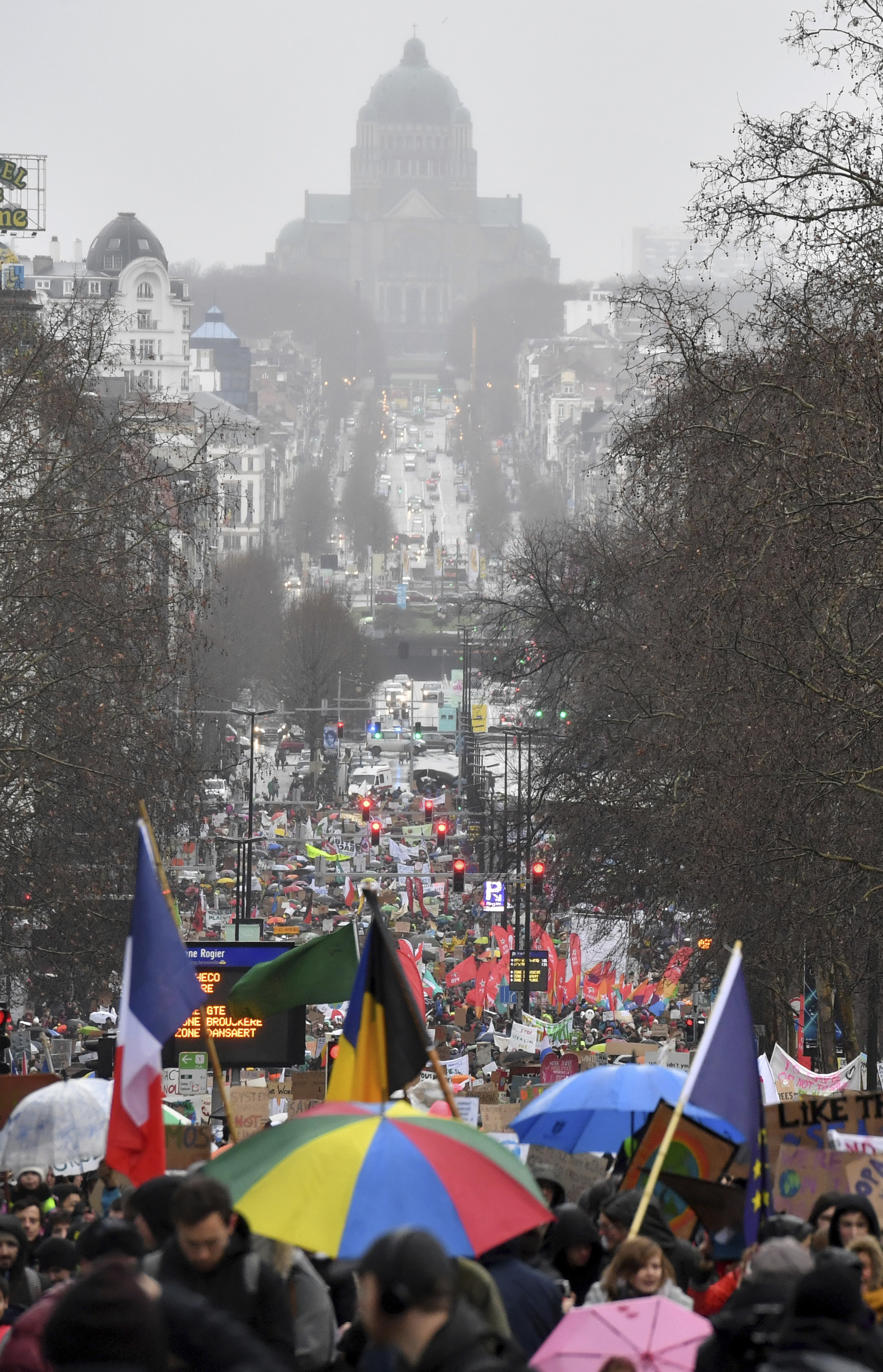 Protestors march during a Rise for the Climate demonstration in Brussels, Sunday, Jan. 27, 2019. (AP Photo/Geert Vanden Wijngaert)