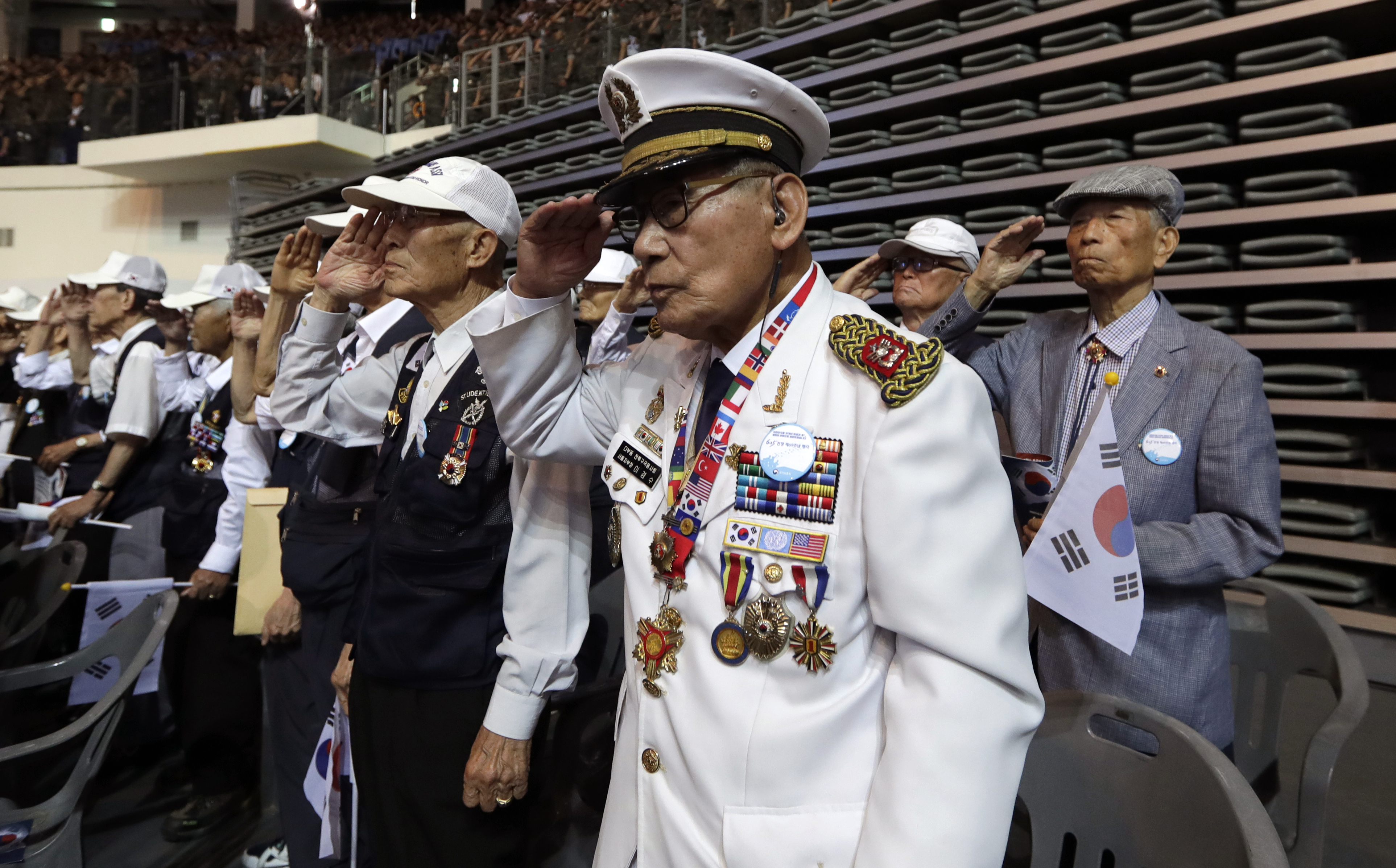 A South Korean war veteran Lee Kyung-su, 90, salutes during a ceremony to mark the 69th anniversary of the outbreak of the Korean War in Seoul, South Korea, Tuesday, June 25, 2019. South Korea and North Korea fought a devastating three-year war in the early 1950s that ended with an armistice, not a peace treaty. (AP Photo/Lee Jin-man)