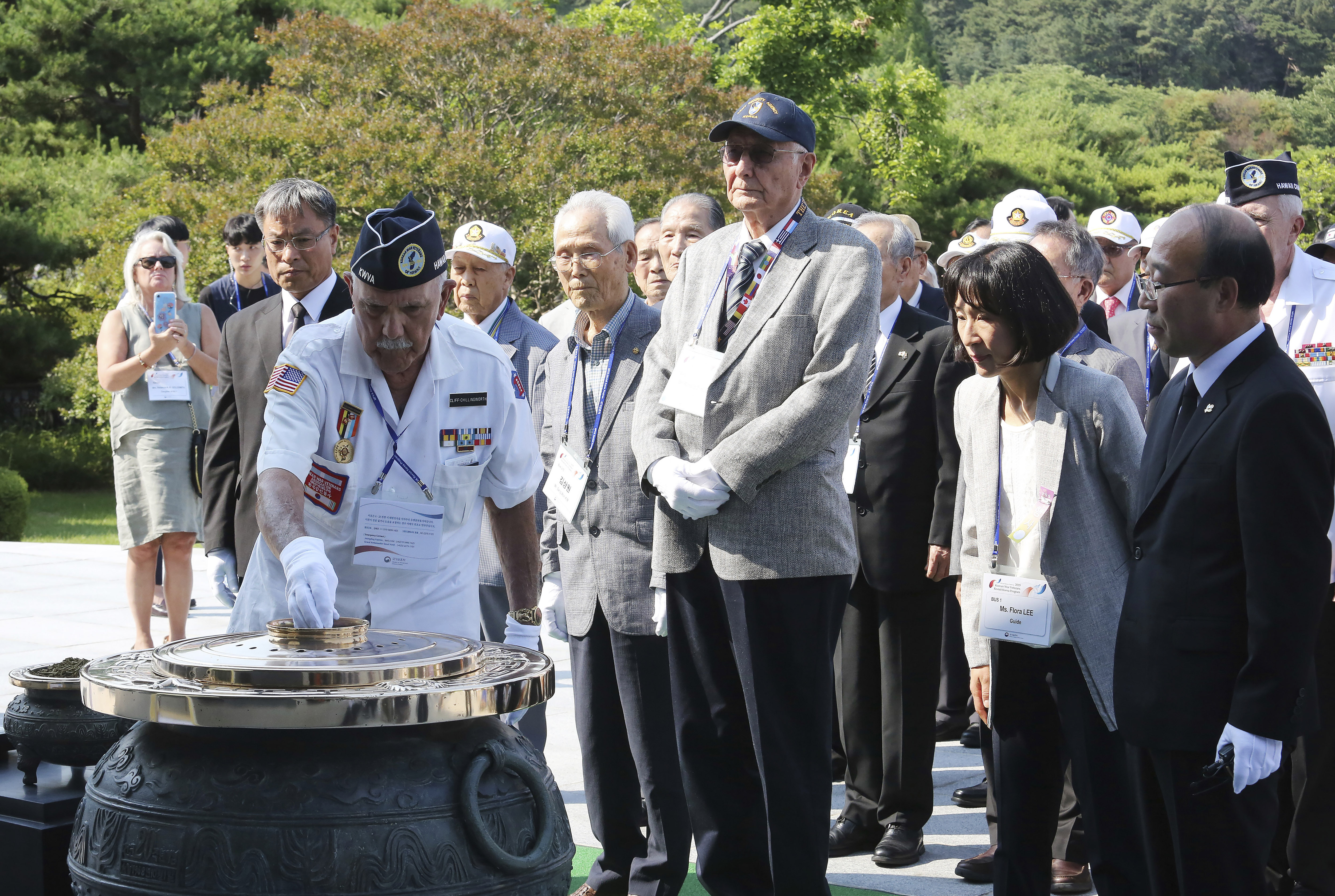 U.S. veteran Clifford K. Chillingworth from Hawaii burns incense on the eve of the 69th anniversary of the outbreak of the Korean War at the National Cemetery in Seoul, South Korea, Monday, June 24, 2019. 62 U.S. war veterans and their families, along with 20 Korean veterans and their families residing overseas, arrived on Sunday, June 23 for a six-day visit to mark the anniversary. (AP Photo/Ahn Young-joon)
