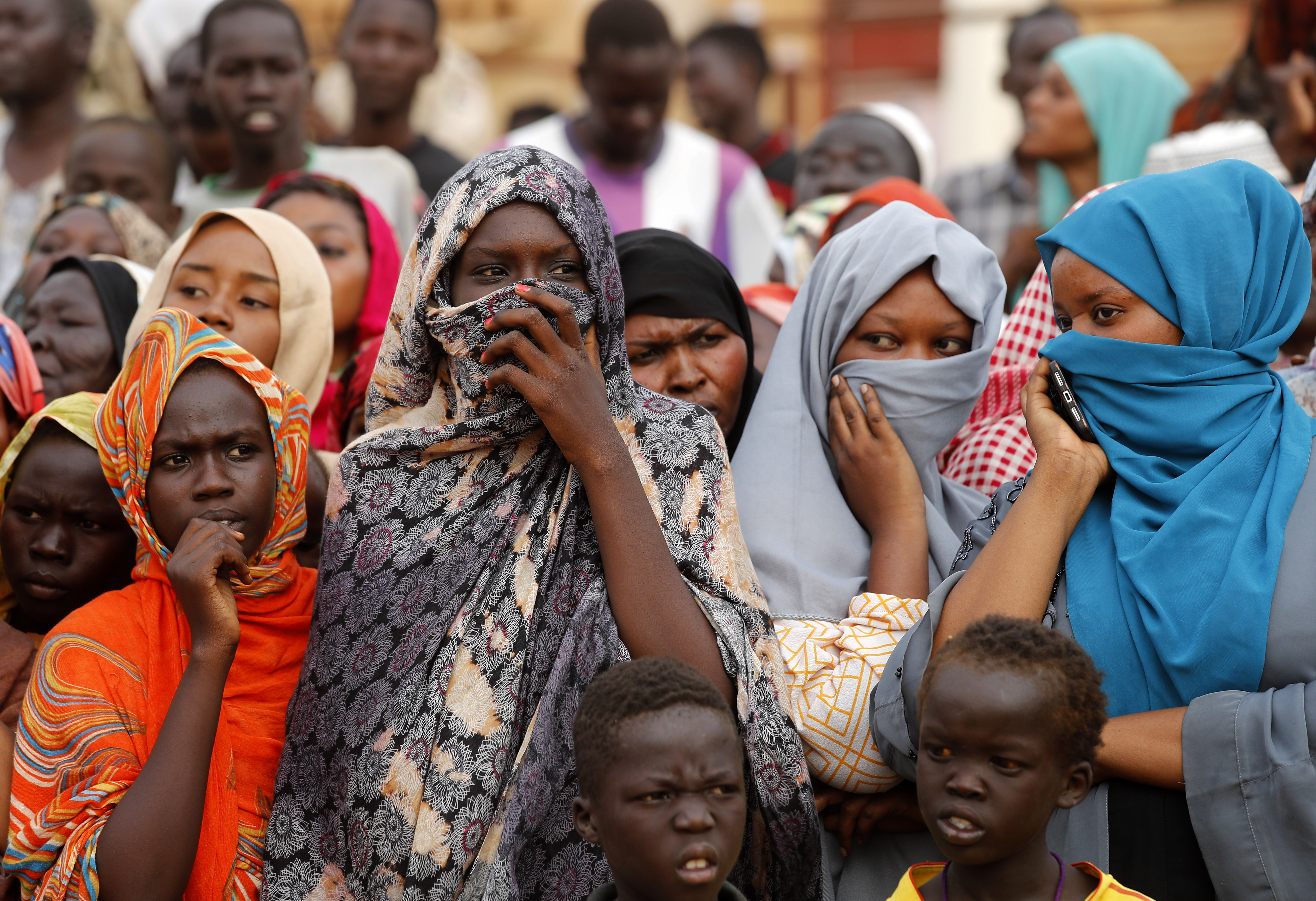 Sudanese women supporters of Gen. Abdel-Fattah Burhan, head of the military council, attend a military-backed rally, in Omdurman district, west of Khartoum, Sudan, Saturday, June 29, 2019. Sudan's ruling military council on Saturday warned protest leaders of 