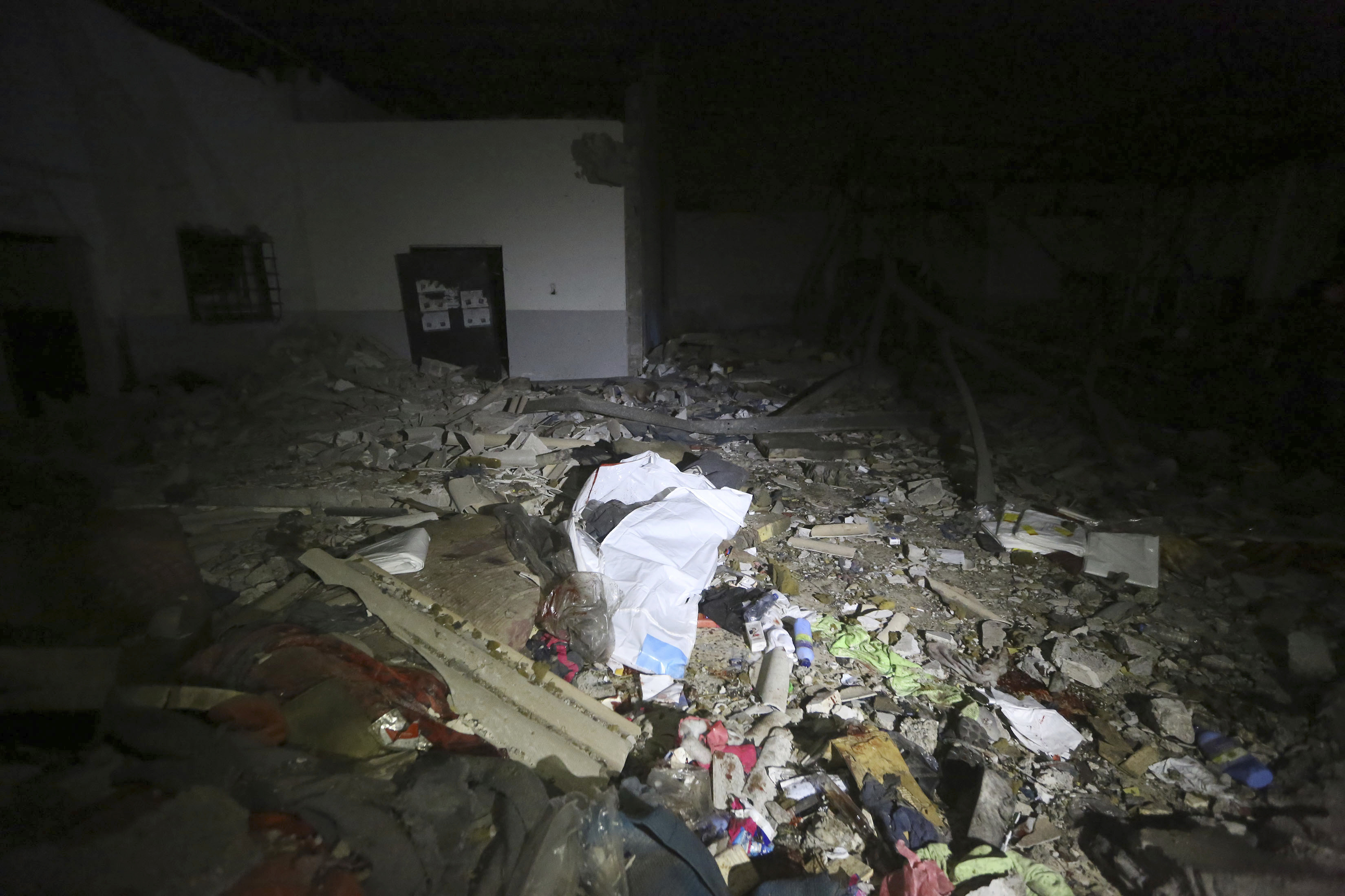 This photo shows the damages after an airstrike at a detention center in Tajoura, east of Tripoli Wednesday, July 3, 2019. An airstrike hit the detention center for migrants early Wednesday in the Libyan capital. (AP Photo/Hazem Ahmed)