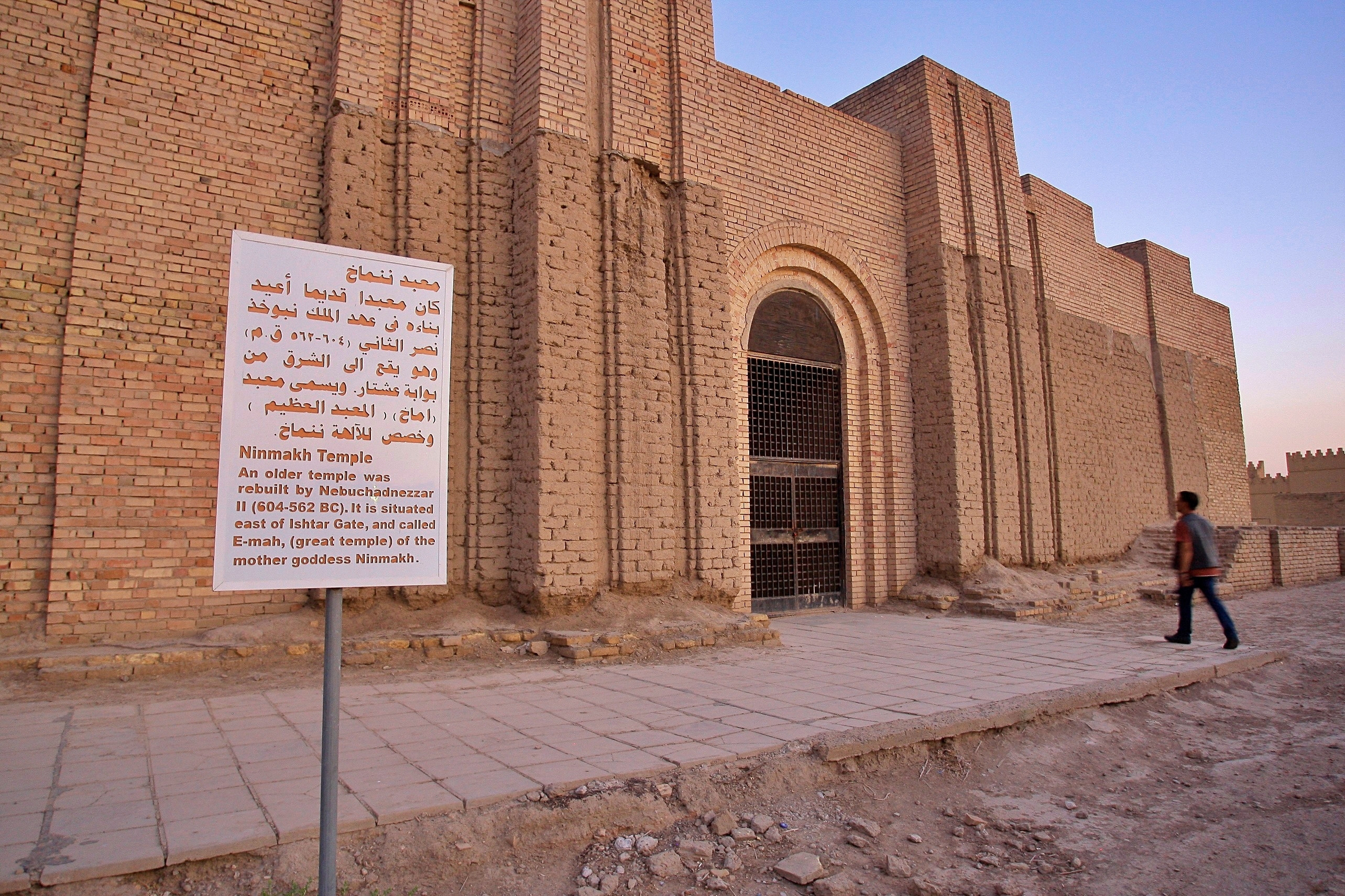 A man visits the archaeological site of Babylon, Iraq, Friday, July 5, 2019. Iraq on Friday celebrated the UNESCO World Heritage Committee's decision to name the historic city of Babylon a World Heritage Site in a vote held in Azerbaijan's capital, years after Baghdad began campaigning for the site to be added to the list. (AP Photo/Anmar Khalil)