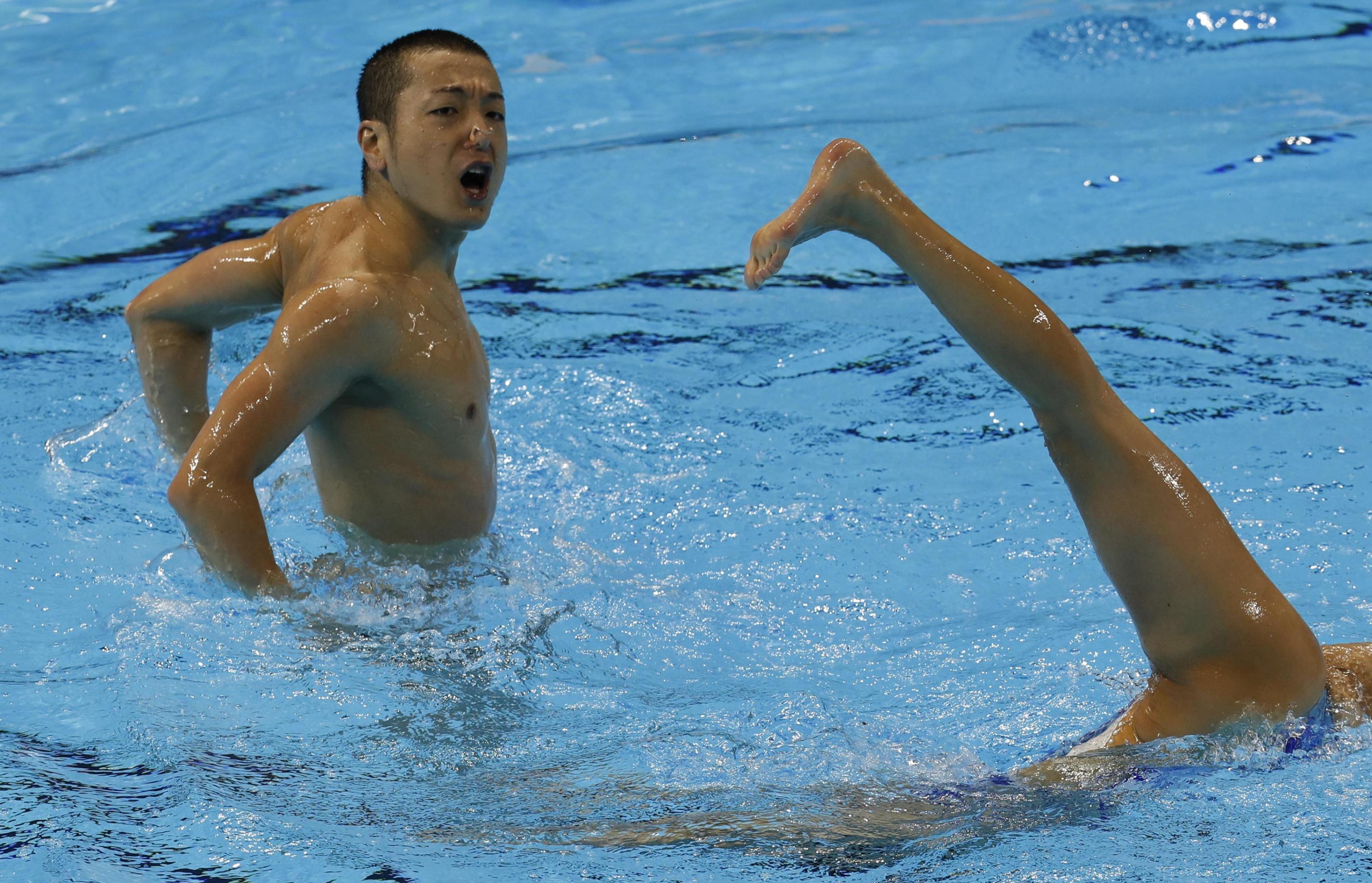 epa07713586 Atsushi Abe and Yumi Adachi of Japan perform during the Mixed Duet Technical Artistic Swimming Preliminary at the FINA Swimming World Championships 2019 on Yeomju gym in Gwangju, South Korea, 13 July 2019.  EPA/JEON HEON-KYUN