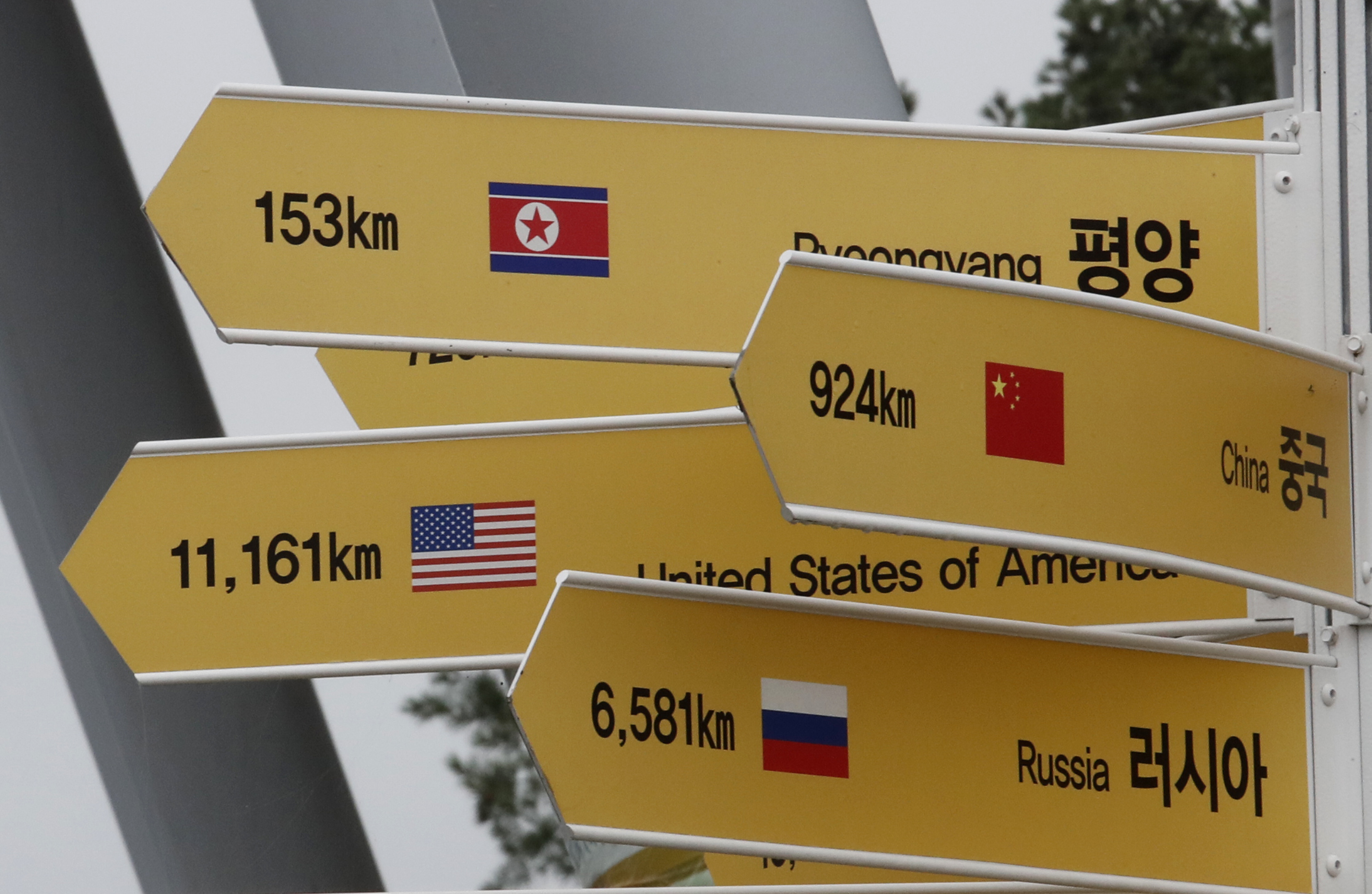A destination sign to North Korea's capital Pyongyang, top, is seen at the Imjingak Pavilion in Paju, South Korea, near the border with North Korea, Thursday, July 25, 2019. North Korea fired two short-range missiles into the sea Thursday, South Korea's military said, the first weapons launches in more than two months and an apparent pressuring tactic aimed at Washington as North Korean and U.S. officials struggle to restart nuclear negotiations. (AP Photo/Ahn Young-joon)