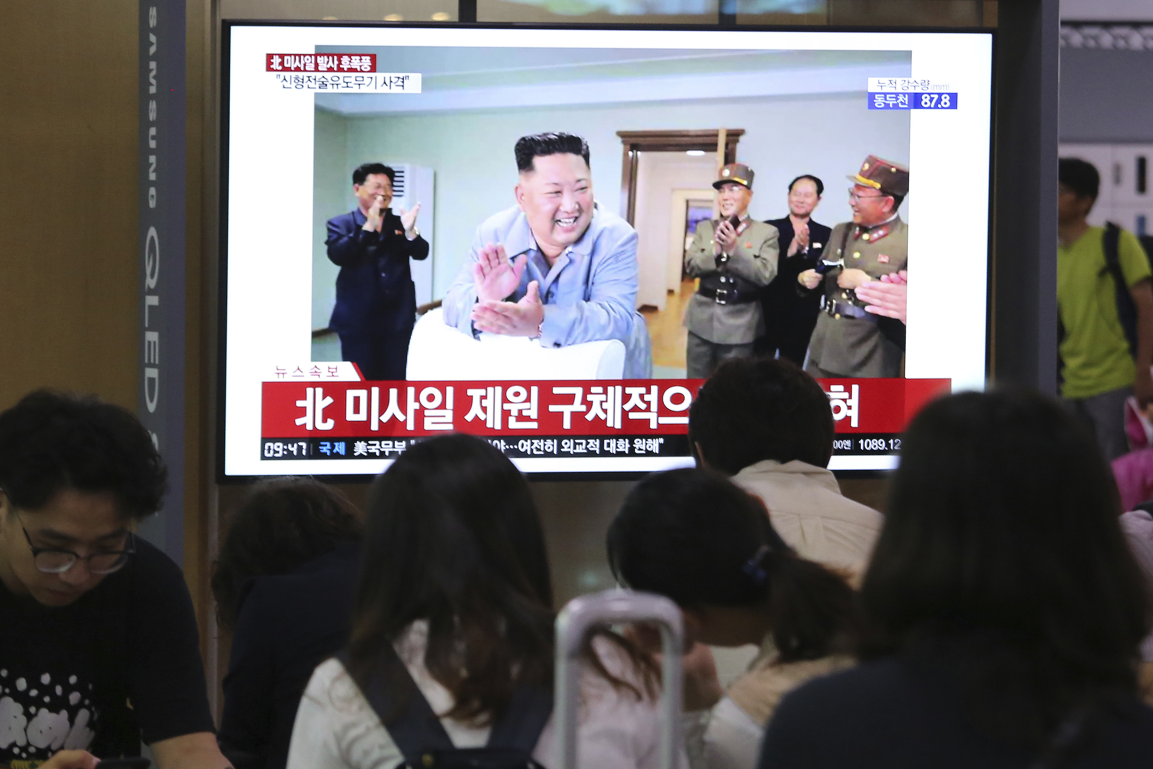 People watch a TV showing an image of North Korean leader Kim Jong Un during a news program at the Seoul Railway Station in Seoul, South Korea, Friday, July 26, 2019. A day after two North Korean missile launches rattled Asia, the nation said Friday it had tested a 