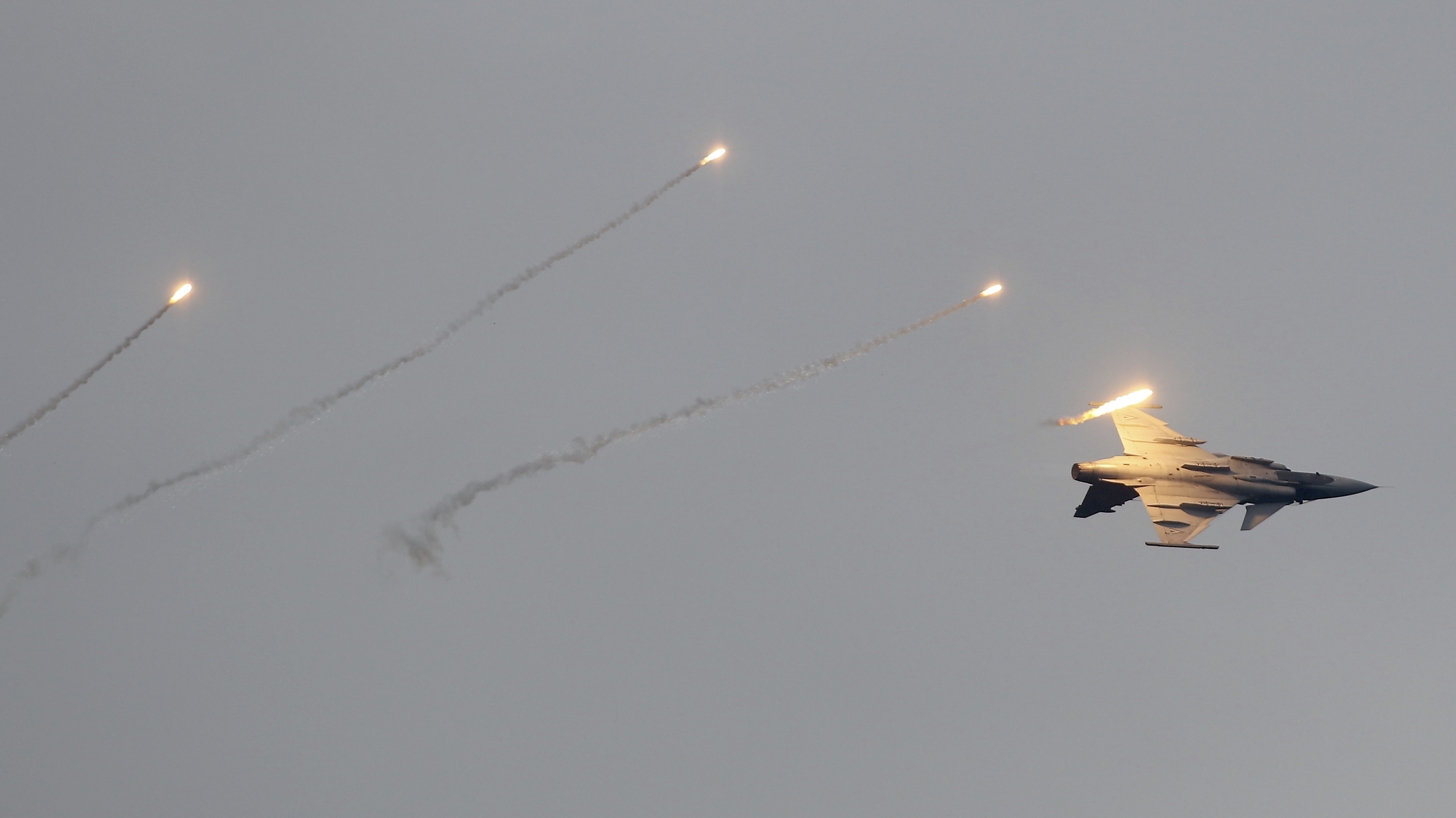 A Saab JAS39 Gripen from the Hungarian Air Force performs during the Airpower 19 airplane show in Zeltweg, Styria, Austria, Friday, Sept. 6, 2019. (AP Photo/Ronald Zak)