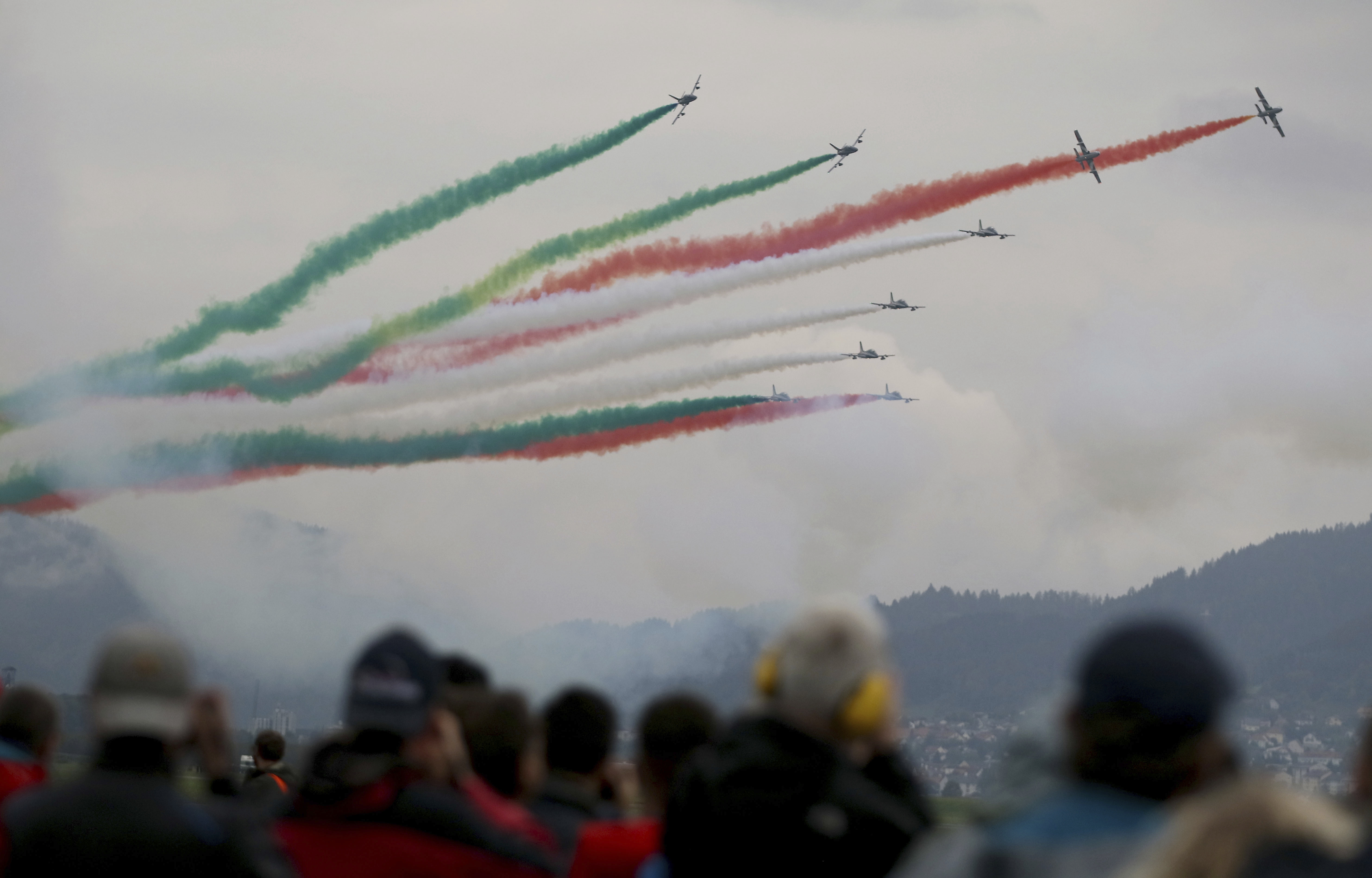 The Frecce Tricolori Italian Air Force aerobatic team performs during the Airpower 19 airplane show in Zeltweg, Styria, Austria, Friday, Sept. 6, 2019. (AP Photo/Ronald Zak)