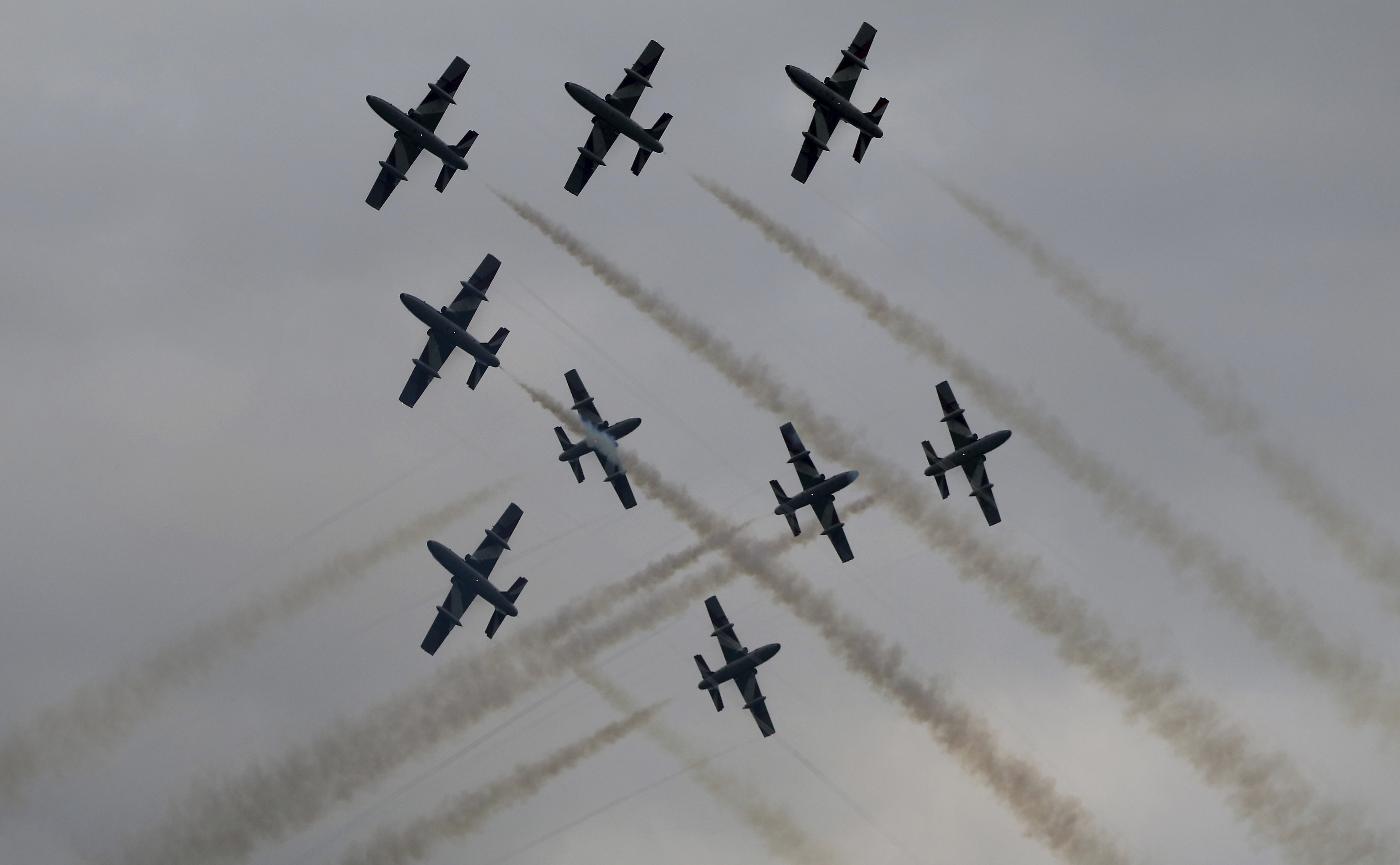 The Frecce Tricolori Italian Air Force aerobatic team performs during the Airpower 19 airplane show in Zeltweg, Styria, Austria, Friday, Sept. 6, 2019. (AP Photo/Ronald Zak)