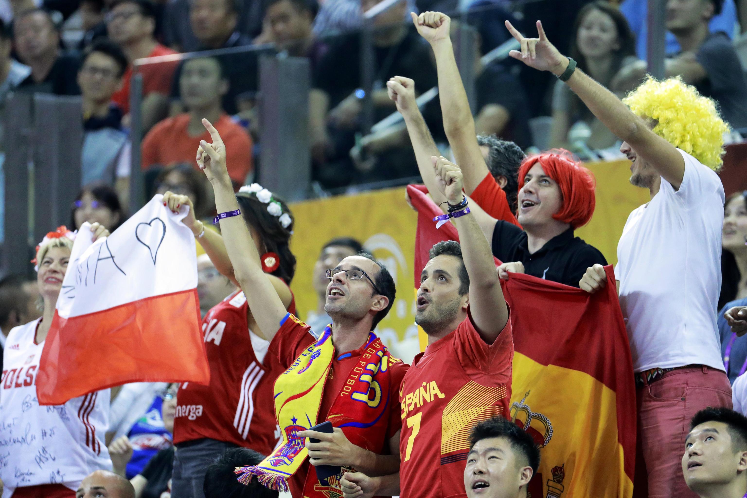 epa07832508 Fans of Poland (L) and Spain (R) cheer during the FIBA Basketball World Cup 2019 quarter finalâ match between Spain and Poland in Shanghai, China, 10 September 2019.  EPA/WU HONG
