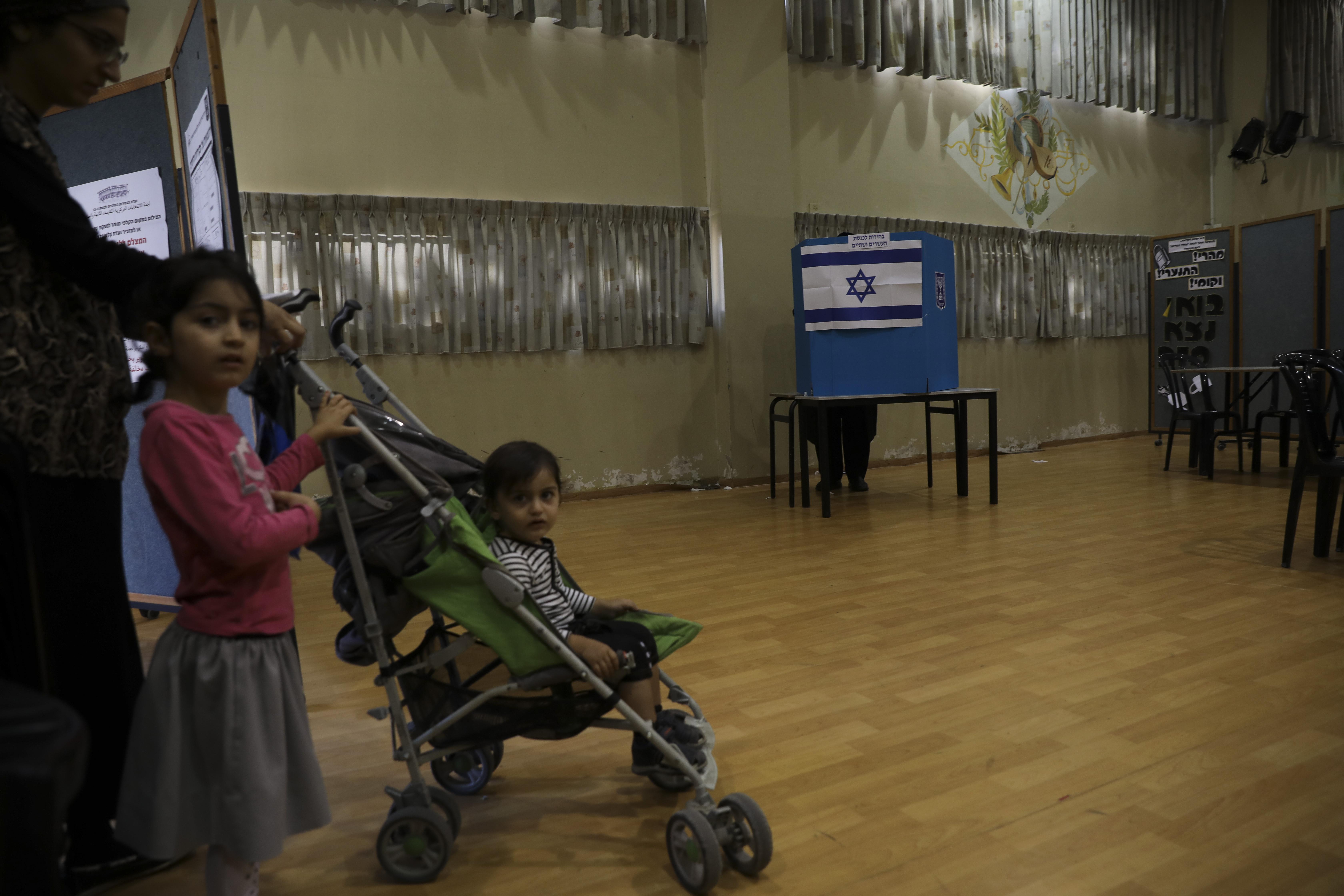 A man votes in Bnei Brak, Israel, Tuesday, Sept. 17, 2019. Israelis began voting Tuesday in an unprecedented repeat election that will decide whether longtime Prime Minister Benjamin Netanyahu stays in power despite a looming indictment on corruption charges. .(AP Photo/Oded Balilty)