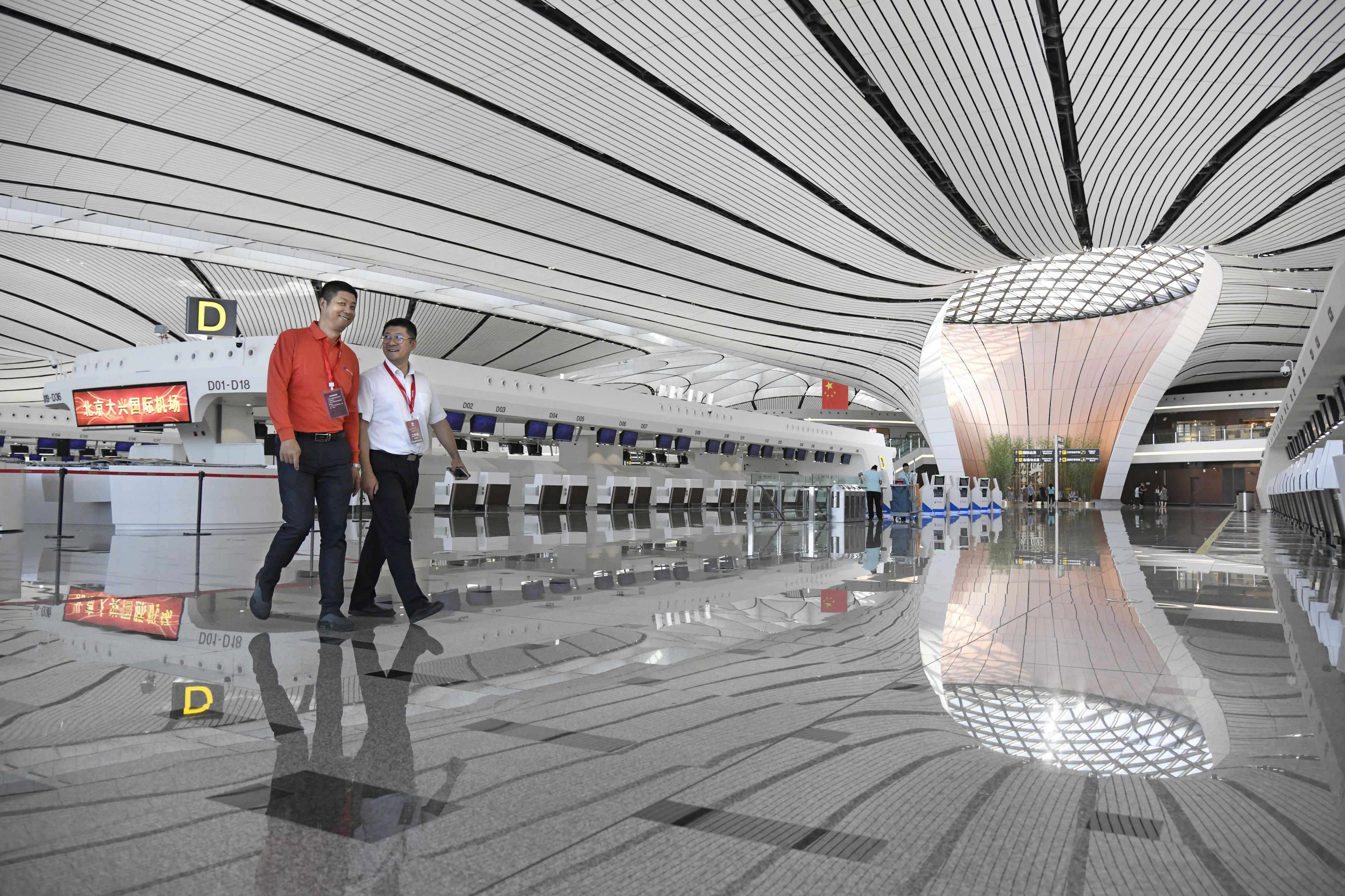The departure lobby is seen at the new Daxing International Airport ahead of the 70th founding anniversary of the People's Republic of China in Beijing, China  Wednesday, Sept. 25, 2019.(Naohiko Hatta/Kyodo News via AP)