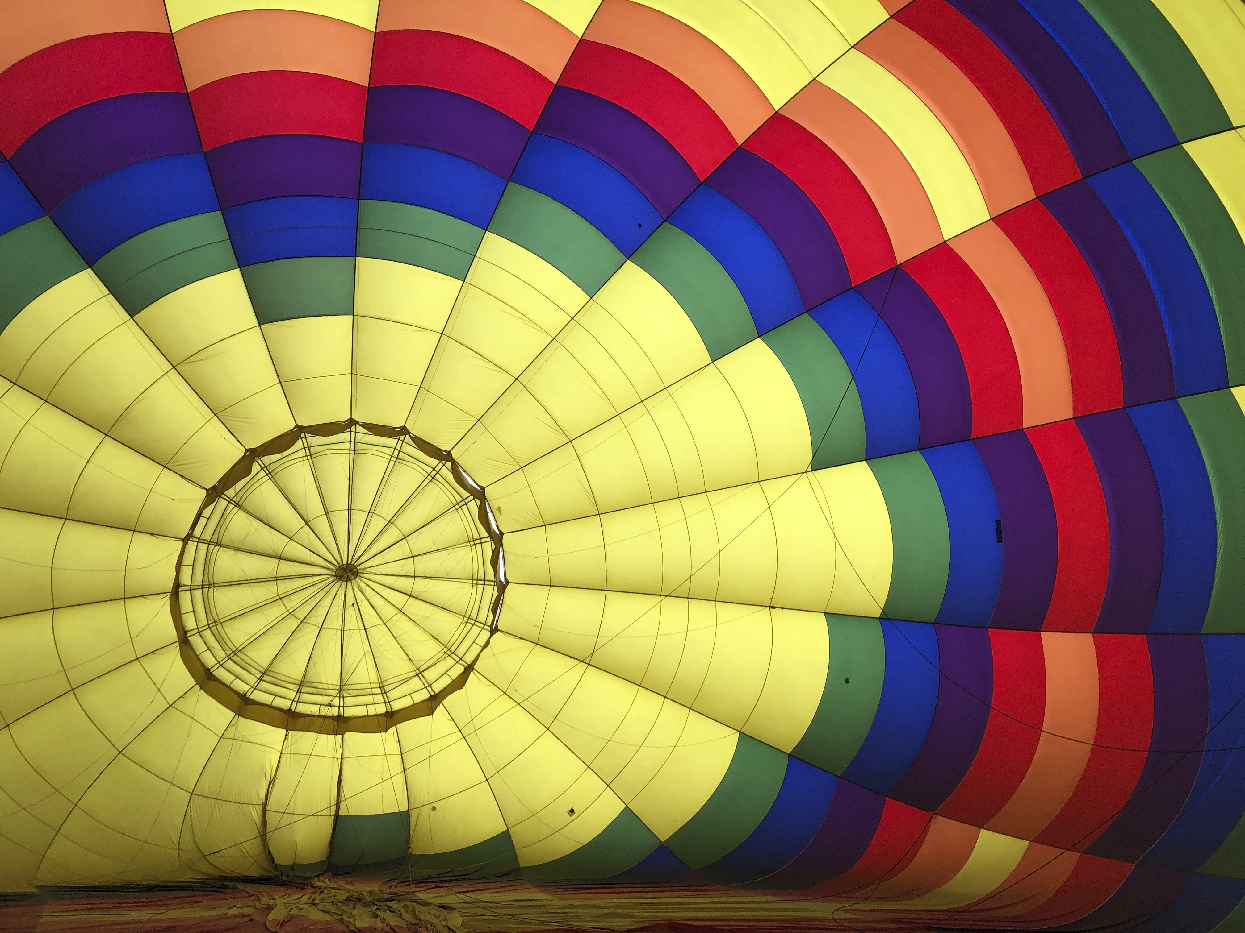 A hot air balloon inflates in Albuquerque, N.M., on Tuesday, Oct. 1, 2019. The annual Albuquerque International Balloon Fiesta is expected to draw several hundred thousand spectators and hundreds of balloonists from around the world. It will kick off Oct. 5 with a mass ascension. (AP Photo/Susan Montoya Bryan)