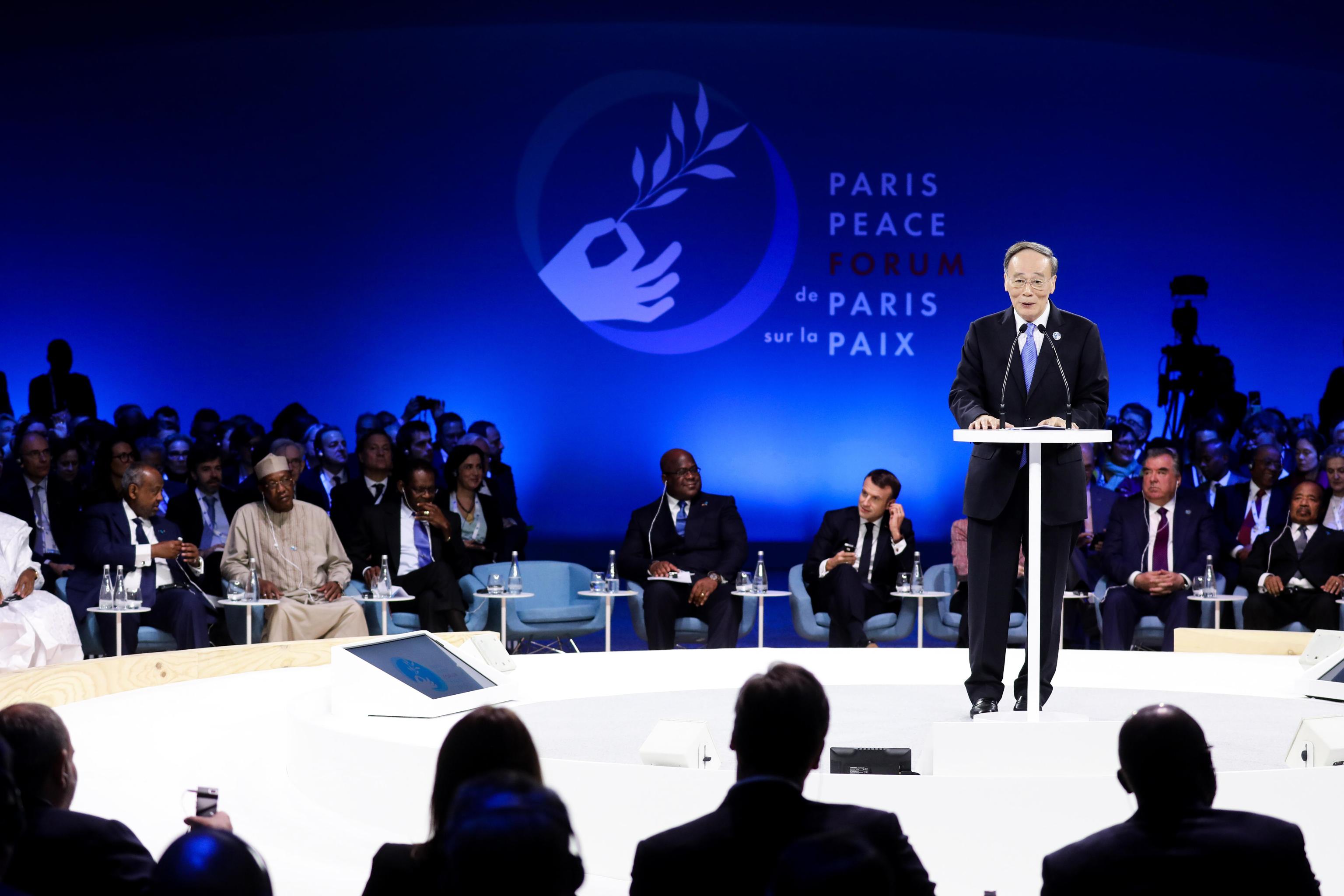 epa07990257 China's Vice President Wang Qishan delivers a speech during the plenary session of the Paris Peace Forum, in Paris, France, 12 November 2019. The international event on global governance issues and multilateralism takes place on 12 to 13 November in Paris.  EPA/LUDOVIC MARIN / POOL MAXPPP OUT
