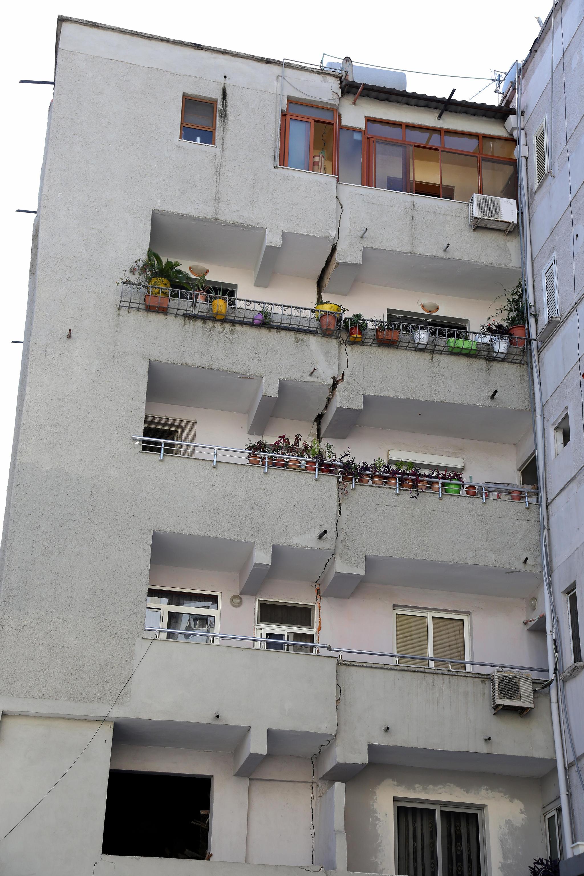 epa07862300 A view of a damaged building in the aftermath of a earthquake in Durres, Albania, 22 September 2019. Albania was hit by an earthquake of 5.8 magnitude on 21 september leaving many people with damaged houses.  EPA/MALTON DIBRA