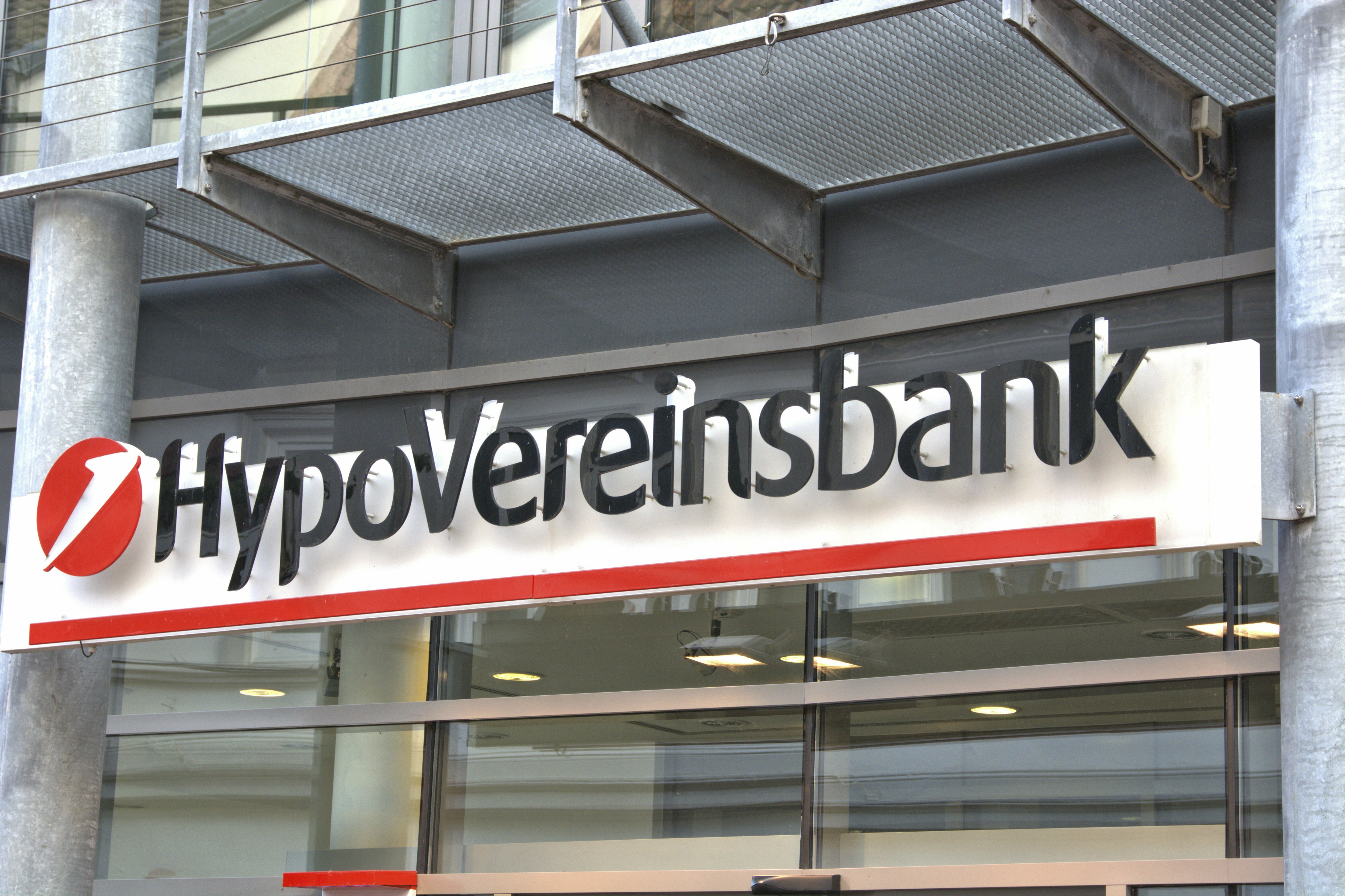 The illuminated sign of a HypoVereinbank branch in Schleswig. HypoVereinsbank is the brand of Unicredit Bank AG with headquarters in Munich. --- For editorial use only --- Only for editorial use! | usage worldwide Photo by: Torsten Sukrow/SULUPRESS.DE/picture-alliance/dpa/AP Images