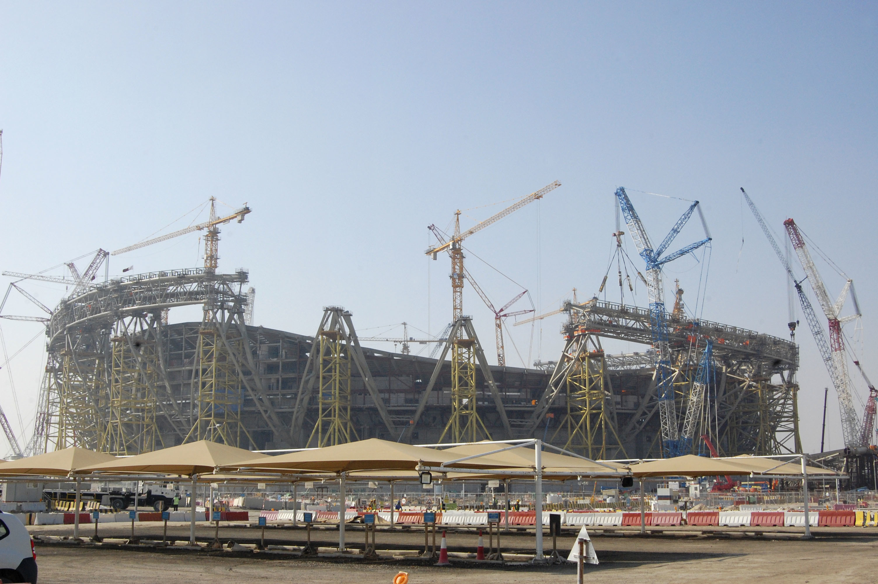 Photo taken Dec. 20, 2019, in Doha, shows Lusail Stadium -- which is scheduled to host the opening and final matches of the 2022 FIFA World Cup -- under construction. (Kyodo via AP Images) ==Kyodo