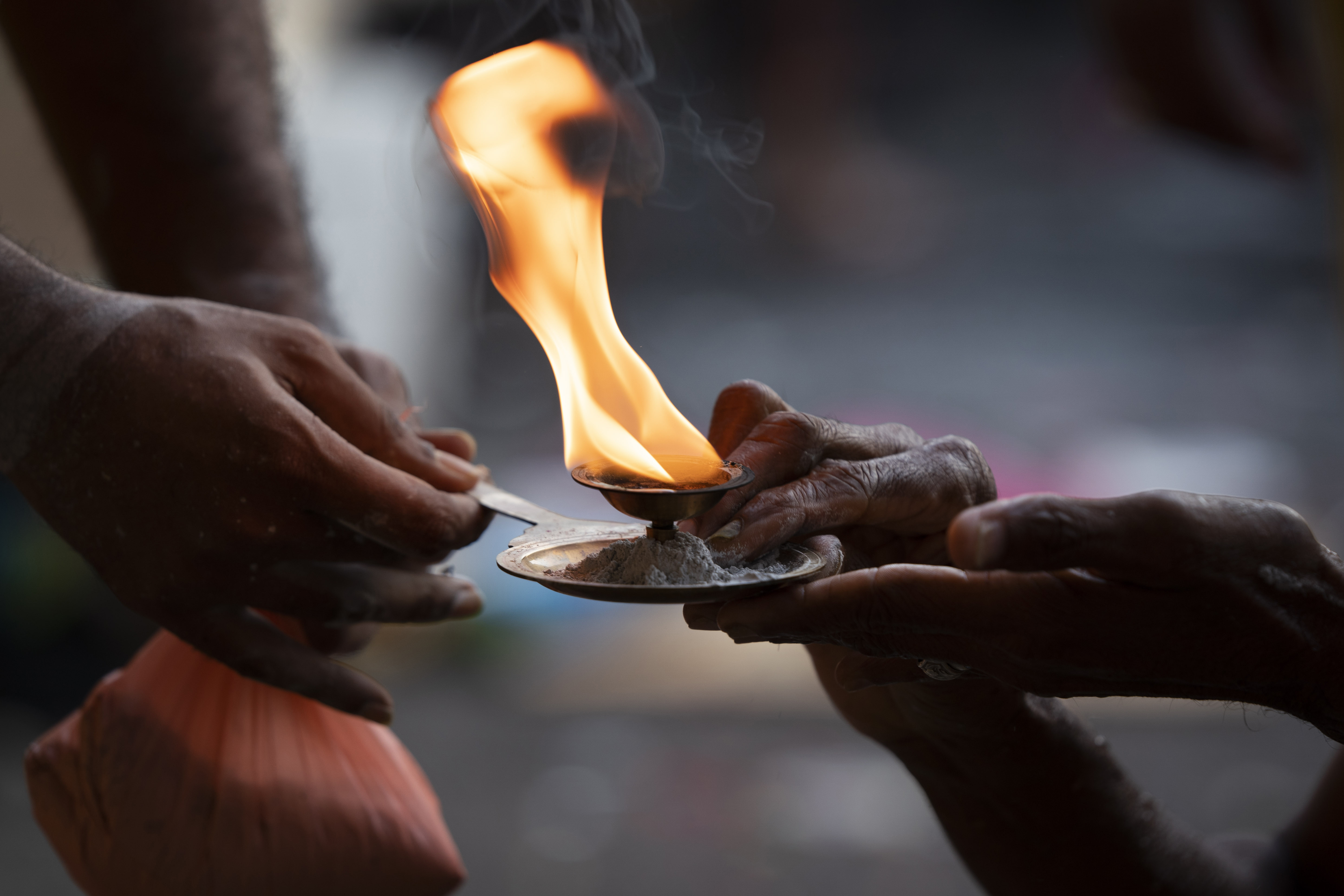 A Hindu devotee offers prayers in a procession during the Thaipusam festival at Batu Caves, outskirts of Kuala Lumpur, Saturday, Feb. 8, 2020. Thaipusam, which is celebrated in honor of Hindu god Lord Murugan, is an annual procession by Hindu devotees seeking blessings, fulfilling vows and offering thanks. (AP Photo/Vincent Thian)