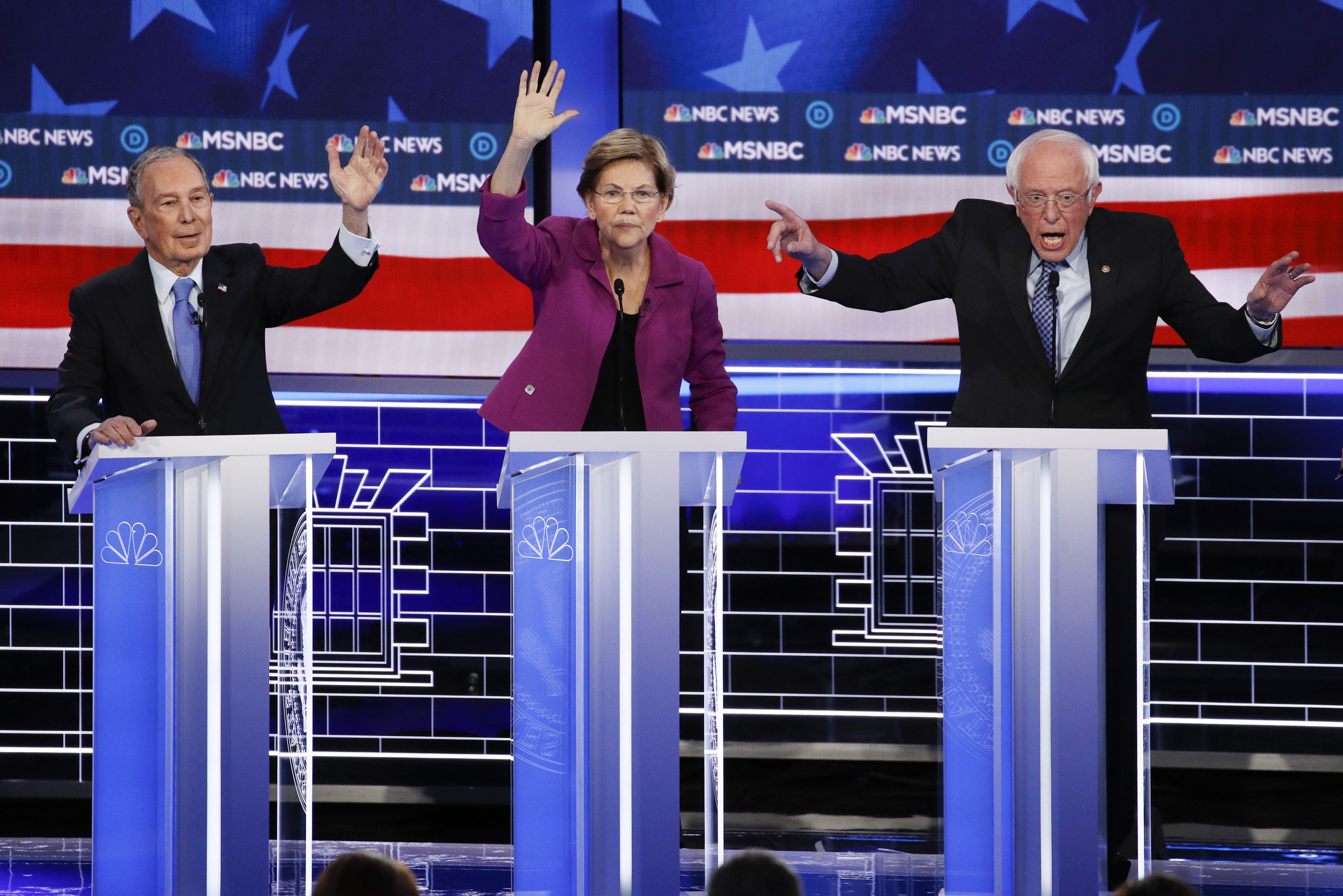 From left, Democratic presidential candidates, former New York City Mayor Mike Bloomberg, Sen. Elizabeth Warren, D-Mass.; and Sen. Bernie Sanders, I-Vt., participate in a Democratic presidential primary debate Wednesday, Feb. 19, 2020, in Las Vegas. Seven casino-resorts are among 200 caucus locations statewide that will host the presidential caucuses on Saturday. (AP Photo/John Locher)