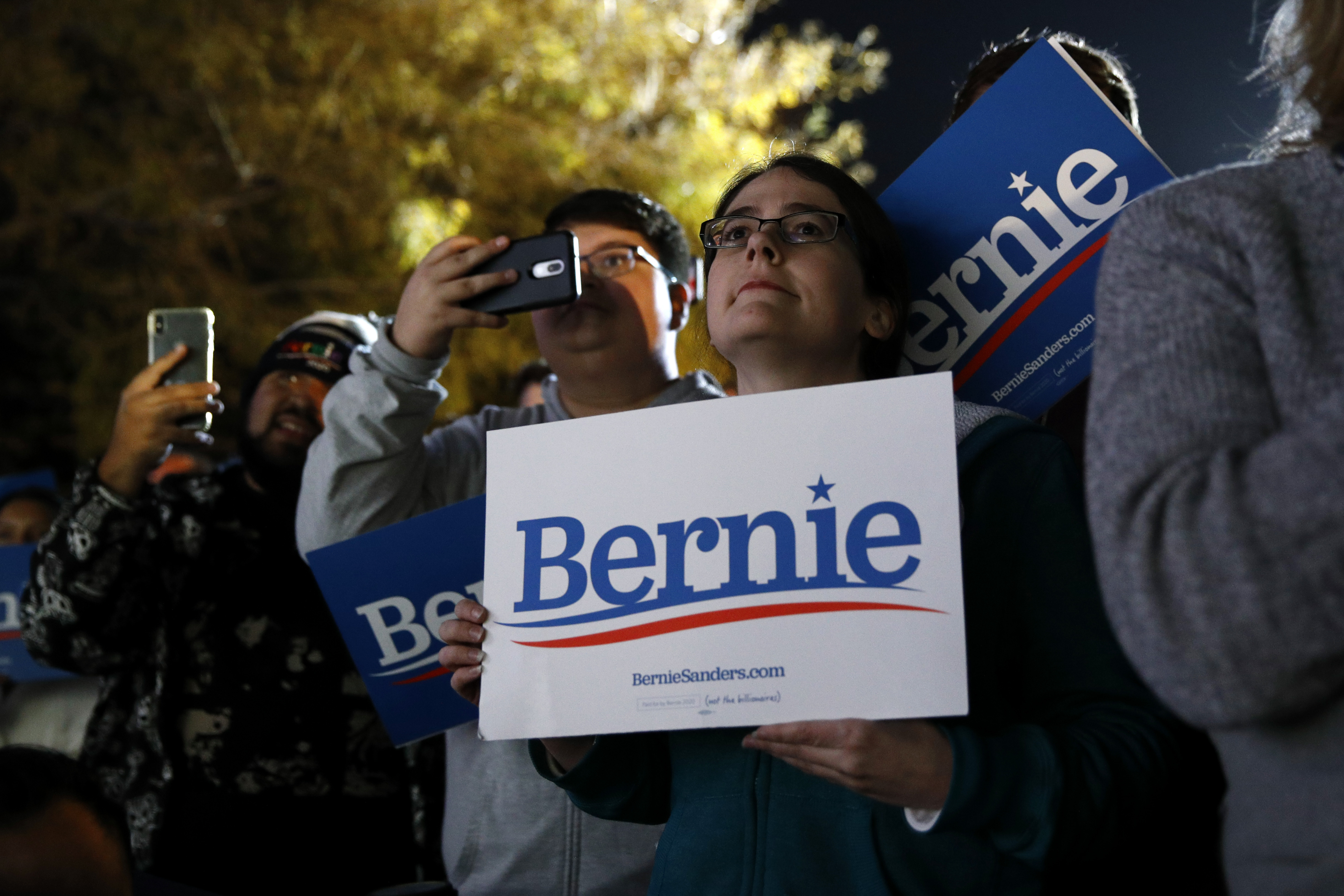 Attendees listen during a campaign event for Democratic presidential candidate Sen. Bernie Sanders, I-Vt., at Springs Preserve in Las Vegas, Friday, Feb. 21, 2020. (AP Photo/Patrick Semansky)
