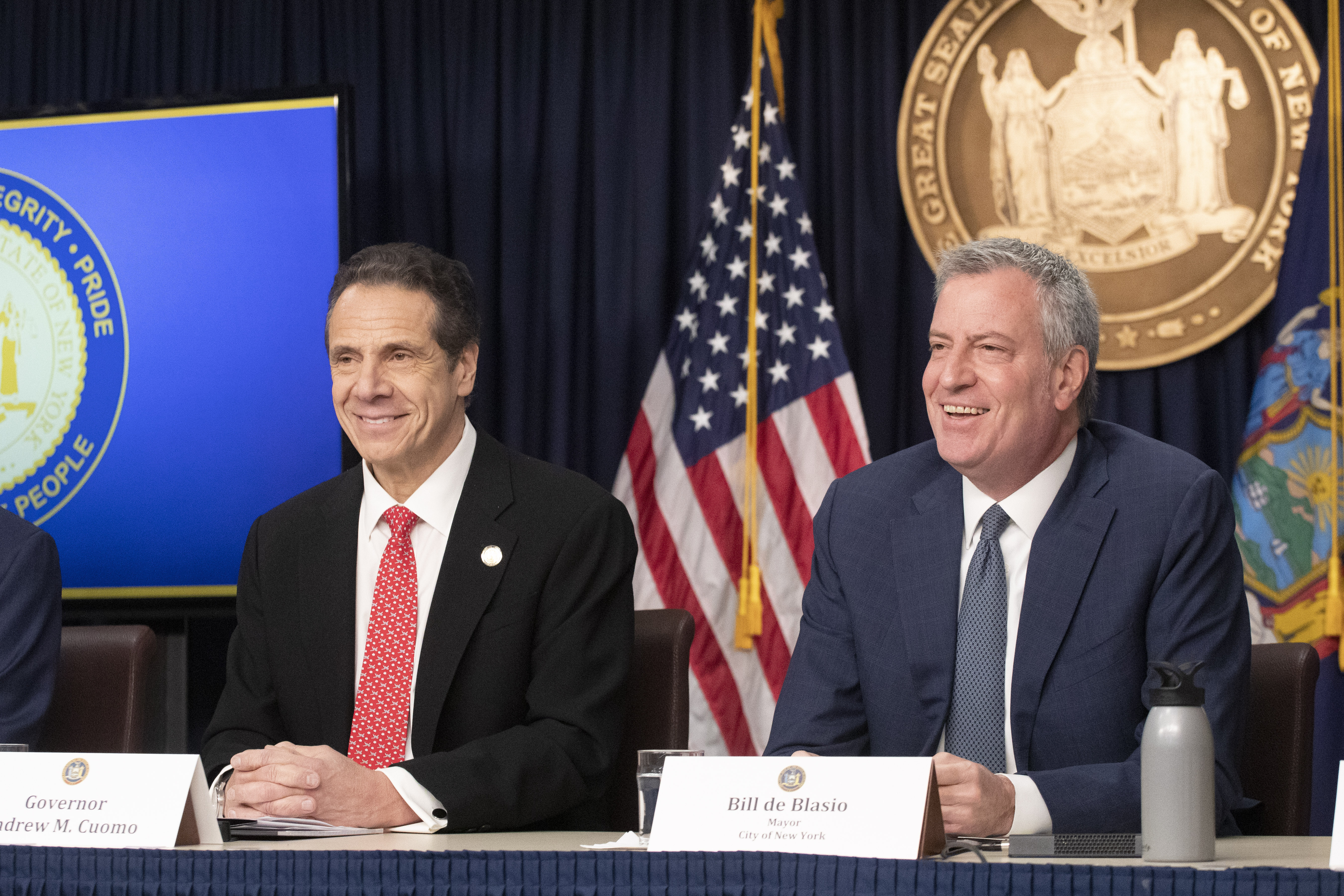 FILE - In this March 2, 2020 file photo New York Gov. Andrew Cuomo, left, and Mayor Bill de Blasio discuss the state and city's preparedness for the spread of coronavirus at a news conference in New York. A dustup over which of the two Democrats gets to say when New York City students can return to school was just the latest example of Cuomo tussling with de Blasio over who is in charge of the nation's most populous city. By Monday, April 13, 2020 the two leaders were still sending conflicting messages even as New York City sent out messages to students, families and teachers that distance learning will continue through June. (AP Photo/Mark Lennihan)