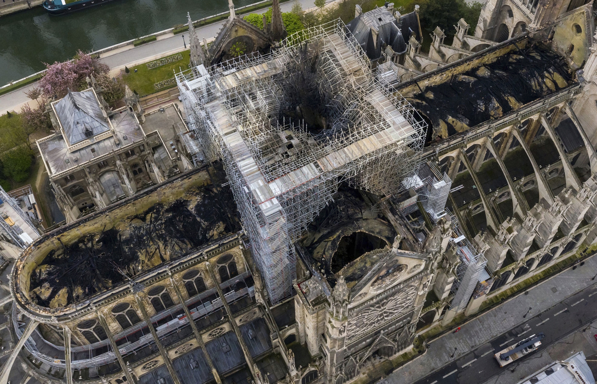 An image made available by Gigarama.ru on Wednesday April 17, 2019 shows an aerial shot of the fire damage to Notre Dame cathedral  in Paris on Tuesday April 16. Nearly $1 billion has already poured in from ordinary worshippers and high-powered magnates around the world to restore Notre Dame Cathedral in Paris after it was damaged in a massive fire on Monday. (Gigarama.ru via AP)