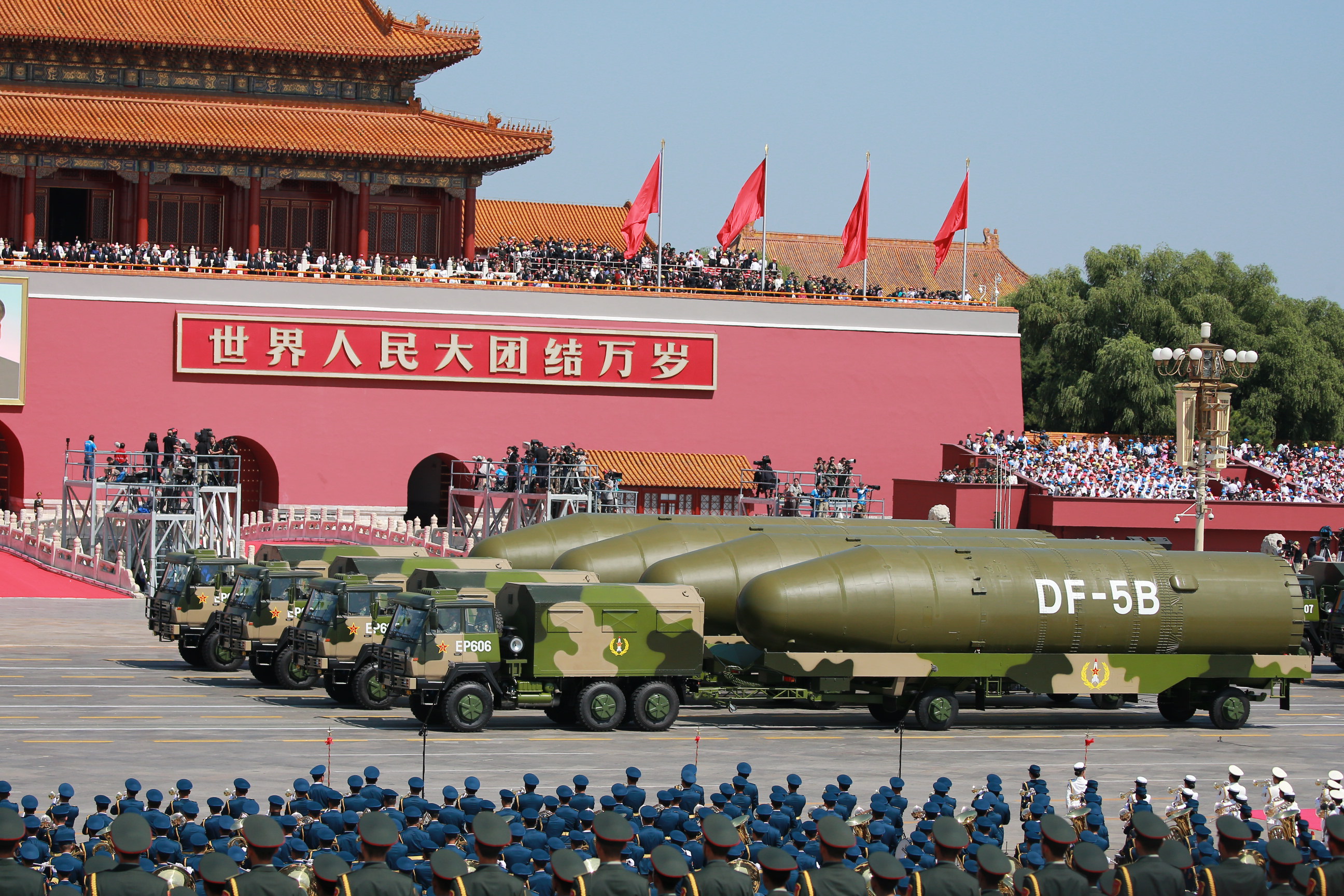 Military vehicles carrying DF-5B liquid-fuel intercontinental ballistic missiles (ICBM) march past the Tiananmen Rostrum during the military parade to commemorate the 70th anniversary of the victory in the Chinese People's War of Resistance Against Japanese Aggression in Beijing, China, 3 September 2015.

China has pledged to cut the number of troops in its army by 300,000, in an unexpected announcement made by Chinese president Xi Jinping on Thursday (3 September 2015). Xi disclosed the news during a speech made before the beginning of a huge military parade in Beijing's Tiananmen Square, held to mark the end of World War II and celebrate China's victory over Japan. Xi said that a 13% cut would be made in the country's 2.3 million-armed forces, stressing that China was committed to peace, although he gave no indication of when it would be implemented. 