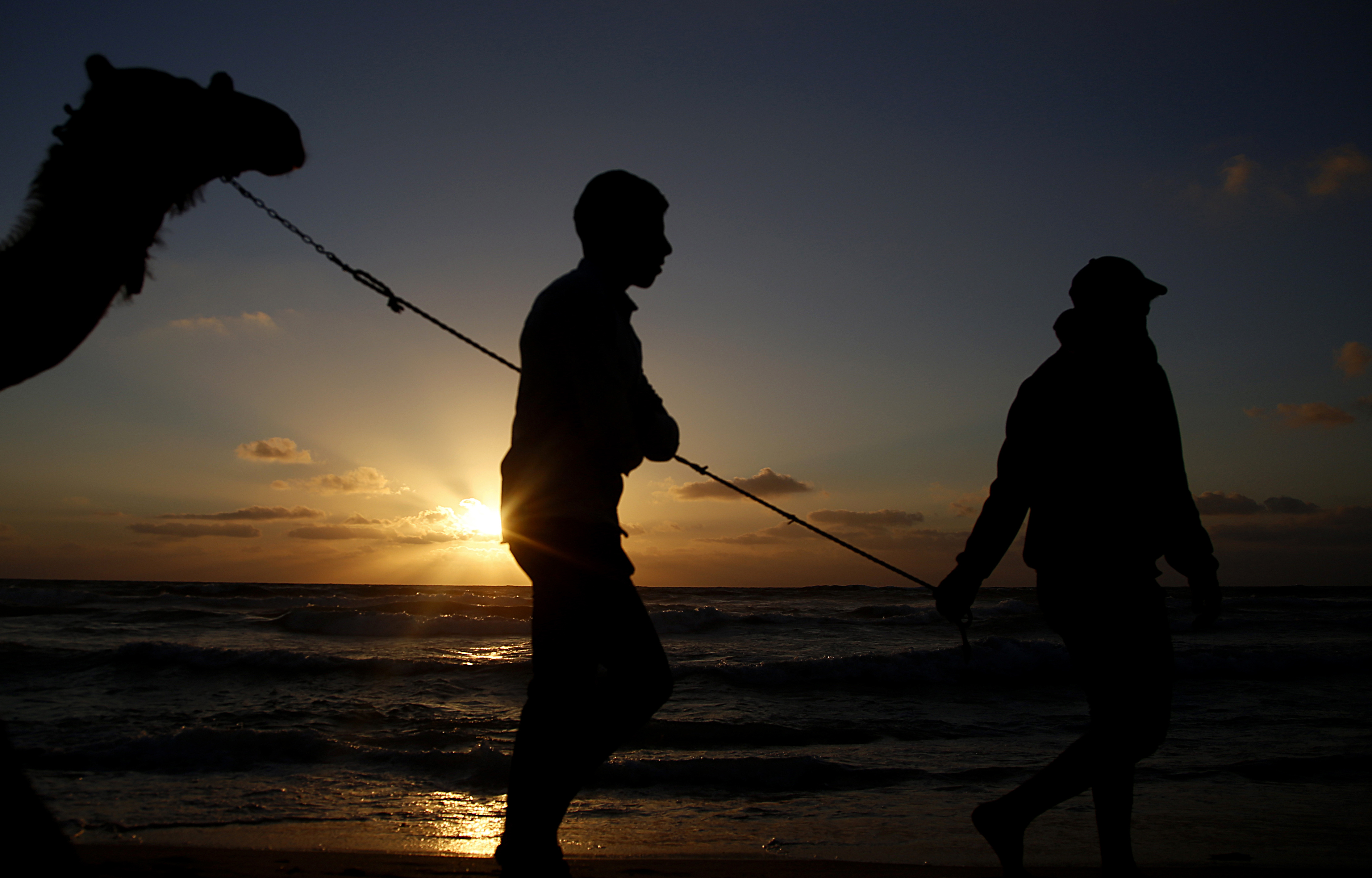 Palestinians enjoy the beach of the Mediterranean sea in Gaza City, Friday, June 19, 2020. The beach is one of the few open public spaces in this densely populated city. (AP Photo/Hatem Moussa)