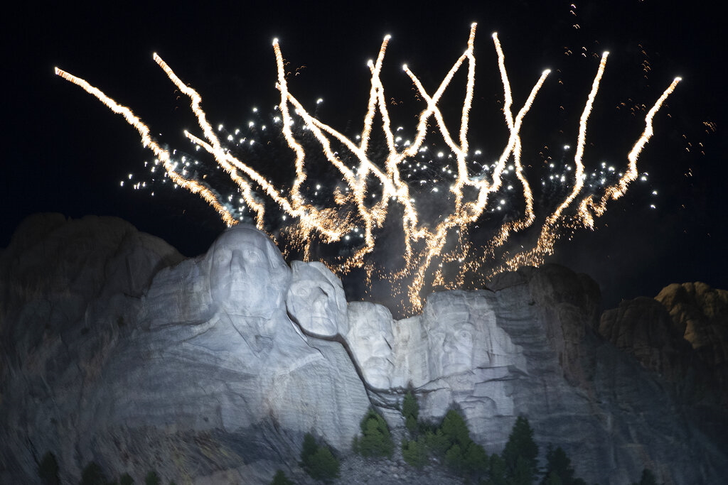 Fireworks burst at Mount Rushmore National Memorial, Friday, July 3, 2020, near Keystone, S.D. (AP Photo/Alex Brandon)