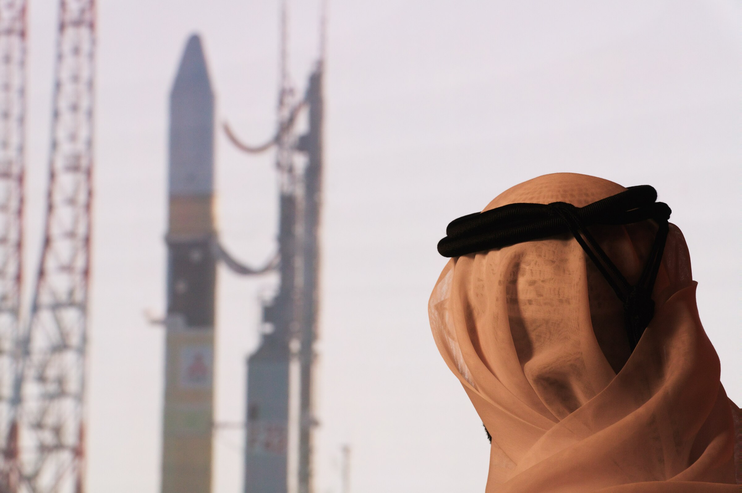 An Emirati man prepares to watch the launch of the "Amal" or "Hope" space probe at the Mohammed bin Rashid Space Center in Dubai, United Arab Emirates, Monday, July 20, 2020. A United Arab Emirates spacecraft, the "Amal" or "Hope" probe, blasted off to Mars from Japan early Monday, starting the Arab world's first interplanetary trip. (AP Photo/Jon Gambrell)