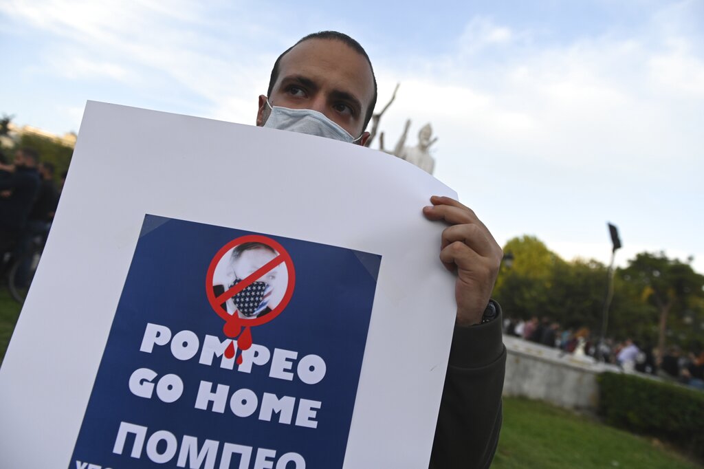 Protesters take part in a rally against the visit of the U.S. Secretary of State Mike Pompeo in Greece, in the northern city of Thessaloniki, on Monday, Sept. 28, 2020. Pompeo said Monday that Washington will use its diplomatic and military influence in the region to try to ease a volatile dispute between NATO allies Greece and Turkey over energy rights in the eastern Mediterranean. (AP Photo/Giannis Papanikos)