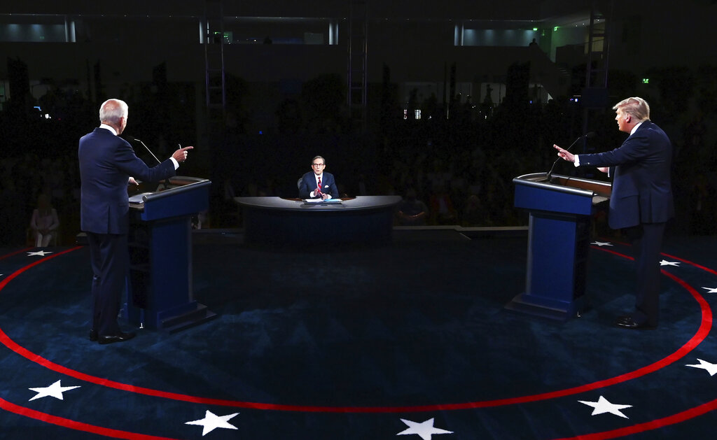 President Donald Trump and Democratic presidential candidate former Vice President Joe Biden participate in the first presidential debate Tuesday, Sept. 29, 2020, at Case Western University and Cleveland Clinic, in Cleveland. (Olivier Douliery/Pool vi AP)