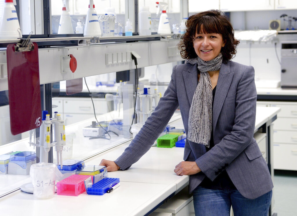 FILE -- In this May 19, 2015 file photo French microbiologist Emmanuelle Charpentier poses for a photo in Brunswick, Germany. French scientist Emmanuelle Charpentier and American Jennifer A. Doudna have won the Nobel Prize 2020 in chemistry for developing a method of genome editing likened to ‘molecular scissors’ that offer the promise of one day curing genetic diseases. (Peter Steffen/dpa via AP)