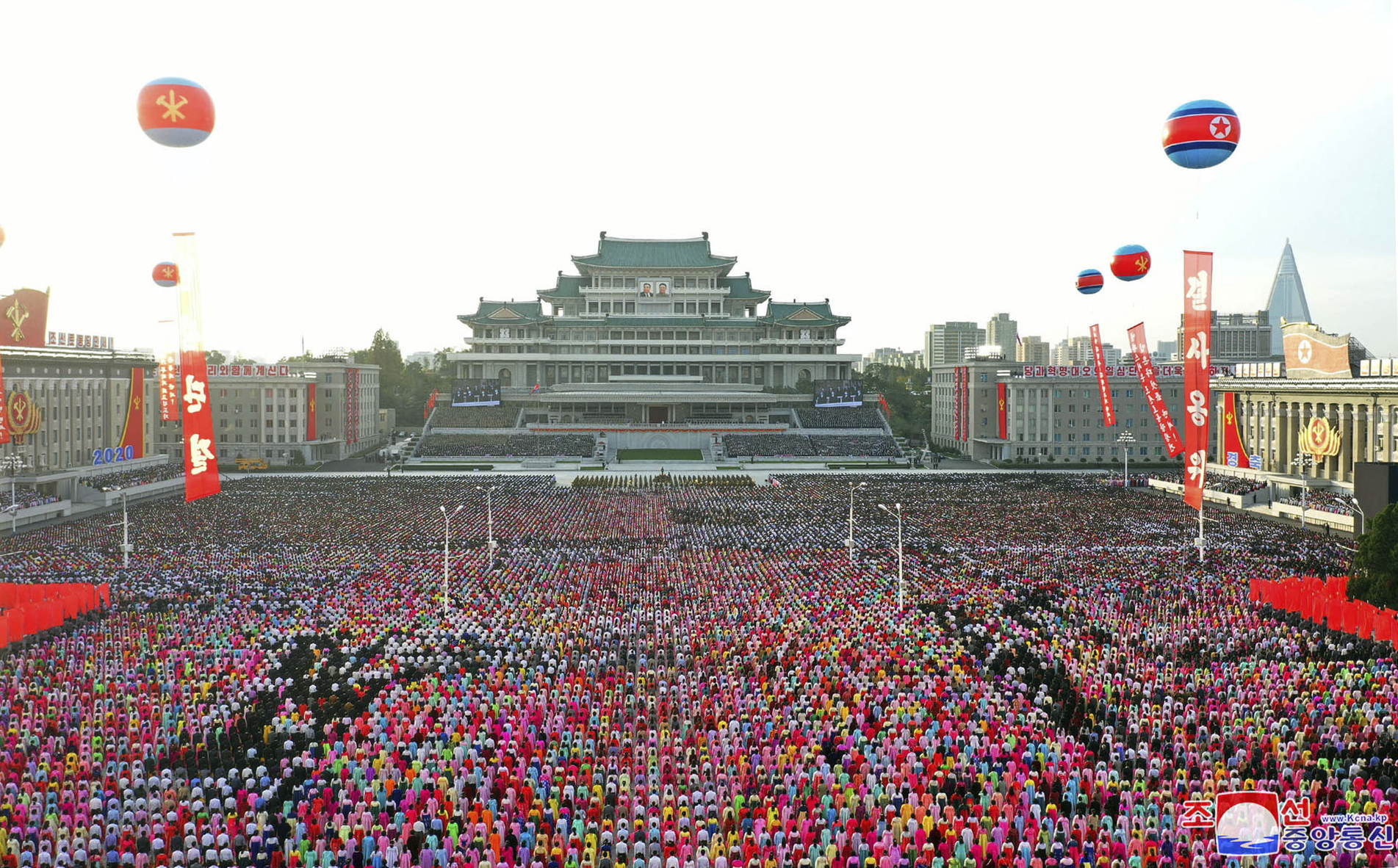In this photo provided by the North Korean government, people celebrate the 75th anniversary of the country’s Workers' Party at the Kim Il Sung Square in Pyongyang, North Korea, Saturday, Oct. 10, 2020. Independent journalists were not given access to cover the event depicted in this image distributed by the North Korean government. The content of this image is as provided and cannot be independently verified. Korean language watermark on image as provided by source reads: 