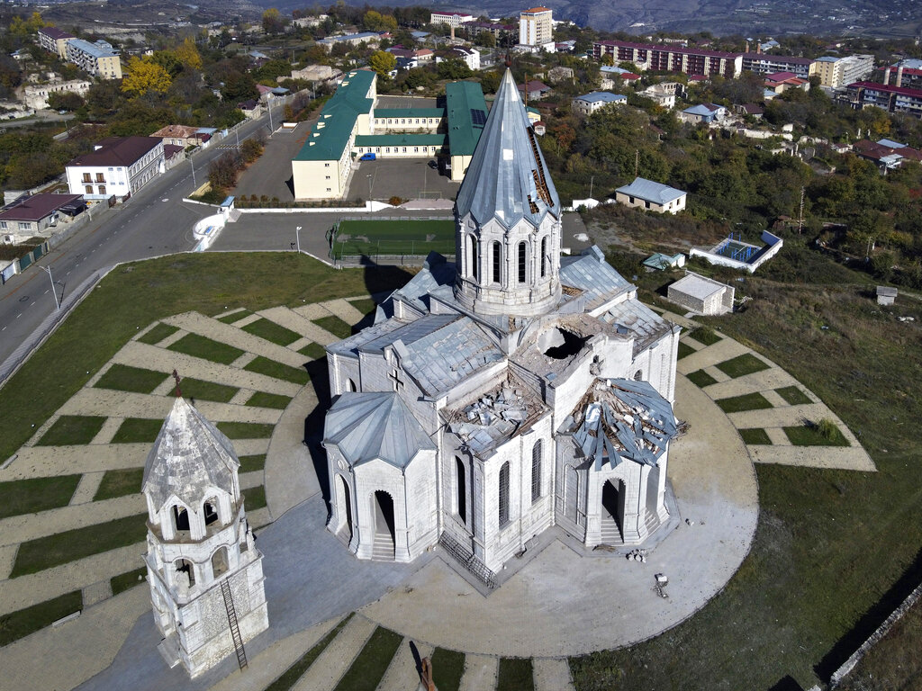 A view of the Holy Savior Cathedral, damaged by shelling by Azerbaijan's artillery during a military conflict in Shushi, the separatist region of Nagorno-Karabakh, Saturday, Oct. 24, 2020. The heavy shelling forced residents of Stepanakert, the regional capital of Nagorno-Karabakh, into shelters, as emergency teams rushed to extinguish fires. Nagorno-Karabakh authorities said other towns in the region were also targeted by Azerbaijani artillery fire. (AP Photo)