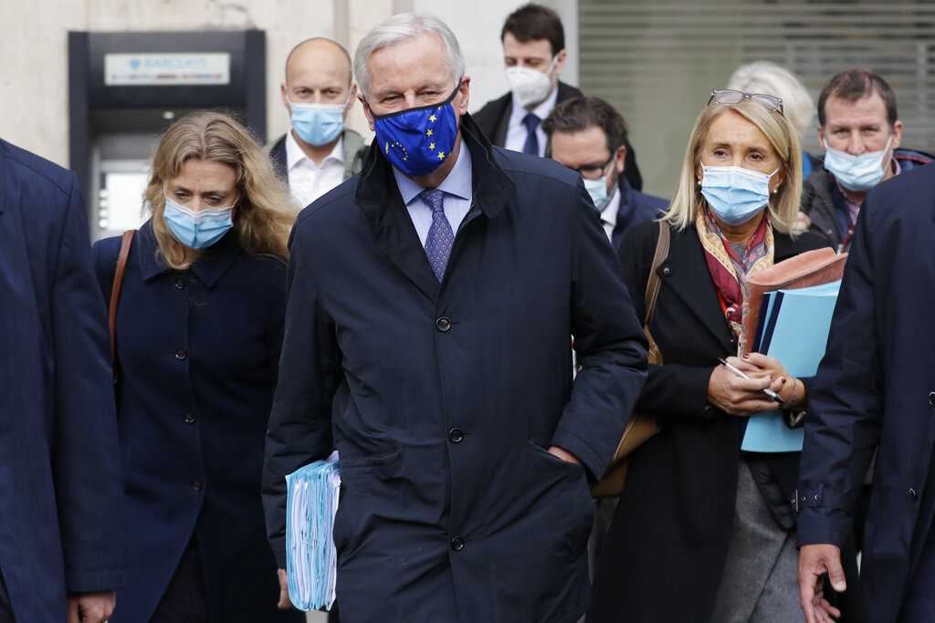 EU Chief negotiator Michel Barnier walks to a meeting in London, Friday, Oct. 23, 2020. Barnier is in London to resume talks over post Brexit trade agreements. (AP Photo/Kirsty Wigglesworth)