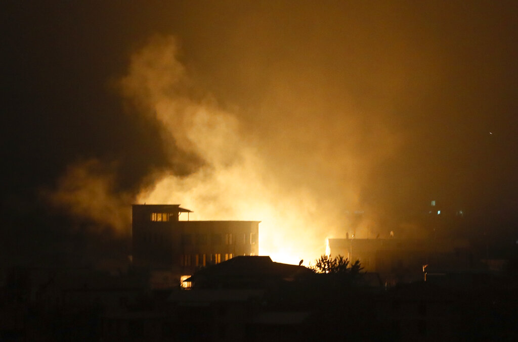 Smoke and fire are seen after shelling by Azerbaijan's artillery in Stepanakert, the separatist region of Nagorno-Karabakh, Tuesday, Nov. 3, 2020. The heavy fighting involving heavy artillery, rockets and drones has raged despite repeated international attempts to end hostilities. (AP Photo)