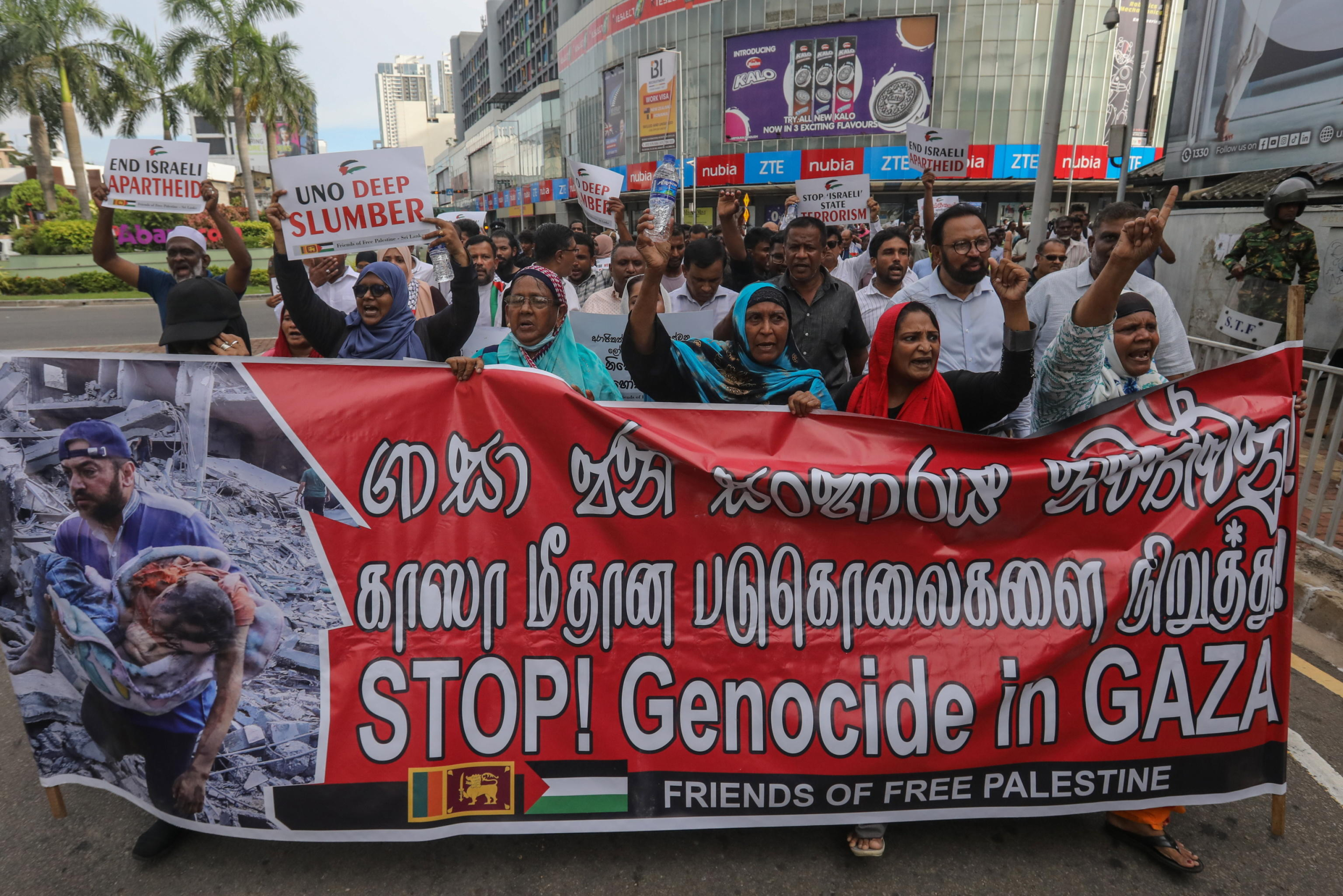 epa11337009 Sri Lankan pro-Palestinian civil rights activists hold placards and shout slogans during a solidarity protest to support the Palestinian people 'Free Gaza Free Palestine' in Colombo, Sri Lanka, 13 May 2023. Sri Lankan pro-Palestinian civil rights activists staged a solidarity protest in Colombo to support the Palestinian people and protest against the Israeli-Hamas conflict, demanding its immediate end and the affirmation of the right to life of the Palestinian people.  EPA/CHAMILA KARUNARATHNE 52283