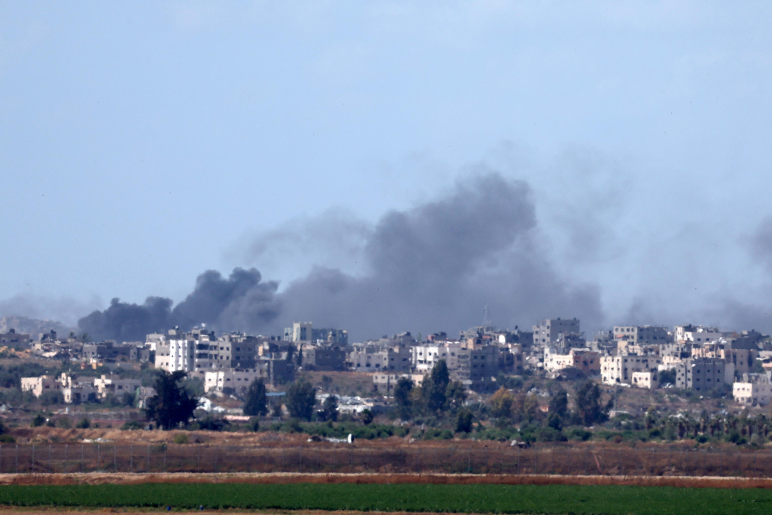 epa11337108 Smoke rises as a result of an Israeli air strike in Jabalia, Gaza Strip, as seen from the Israeli side of the border, southern Israel, 13 May 2024. More than 34,900 Palestinians and over 1,455 Israelis have been killed, according to the Palestinian Health Ministry and the Israel Defense Forces (IDF), since Hamas militants launched an attack against Israel from the Gaza Strip on 07 October 2023, and the Israeli operations in Gaza and the West Bank which followed it  EPA/ATEF SAFADI