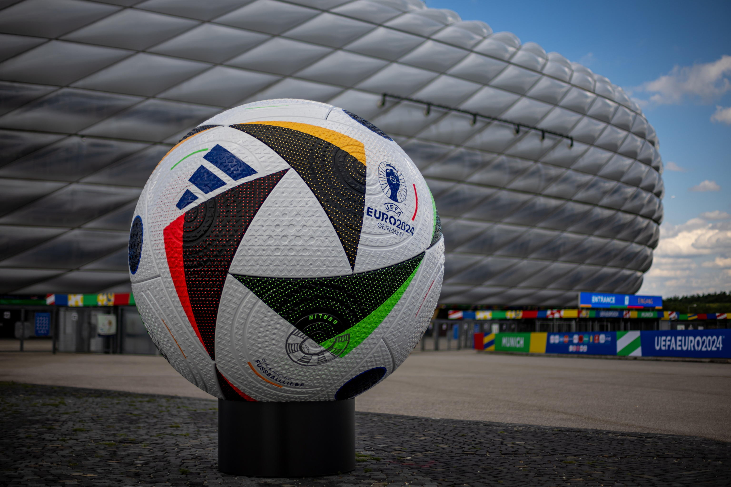 epa11407895 A giant official soccer ball replica on display outside the Allianz Arena, on the eve of the UEFA EURO 2024 opening match between Germany and Scotland, in Munich, Germany, 13 June 2024. The UEFA EURO 2024 runs from 14 June to 14 July in Germany.  EPA/MARTIN DIVISEK